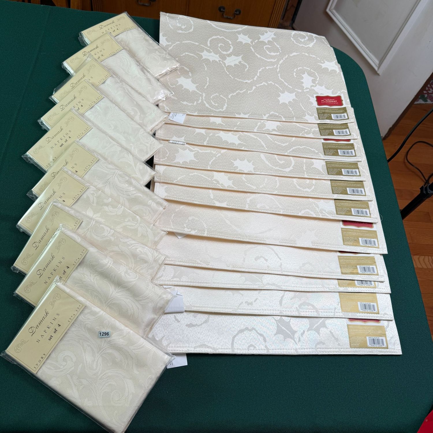 Group of new ivory placemats and packages of napkins S1296 Group of new ivory placemats and packages of napkins S1296