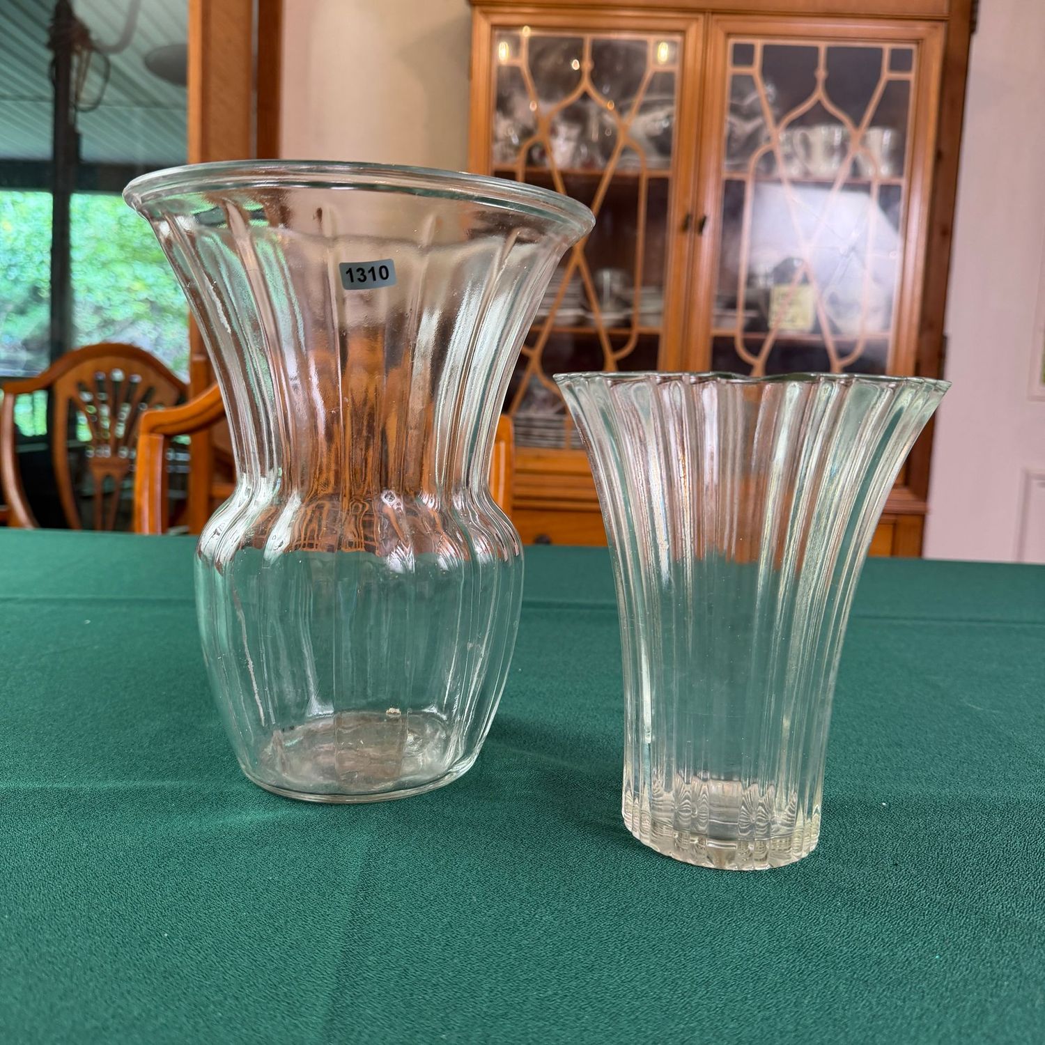 Two clear glass vases with flared mouths, the tallest is 10 Two clear glass vases with flared mouths, the tallest is 10", S1310