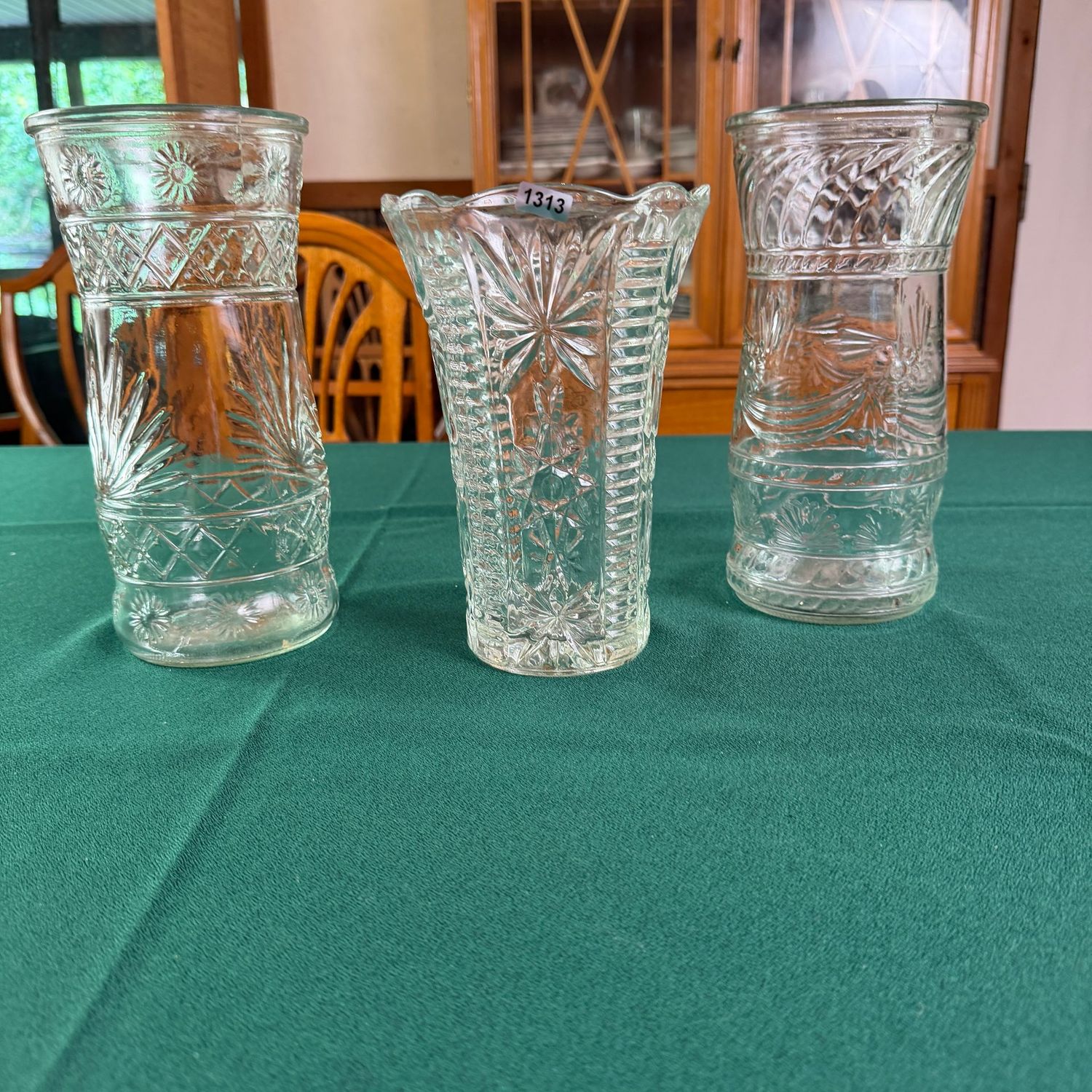 Three clear glass vases, the tallest is 10 Three clear glass vases, the tallest is 10", S1313