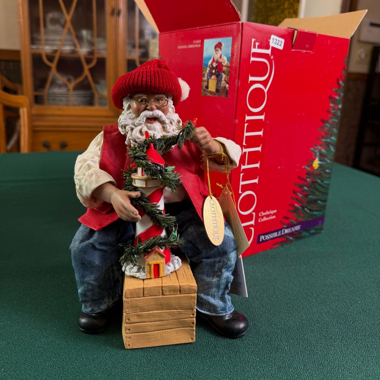 Clothtique Coastal Christmas Santa decorating a lighthouse, 8.5 Clothtique Coastal Christmas Santa decorating a lighthouse, 8.5"H, S1322