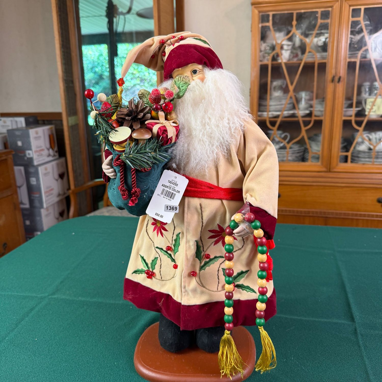 Rustic Santa with poinsettia outfit, beads on left hand may need glued, 19 Rustic Santa with poinsettia outfit, beads on left hand may need glued, 19"H, S1369