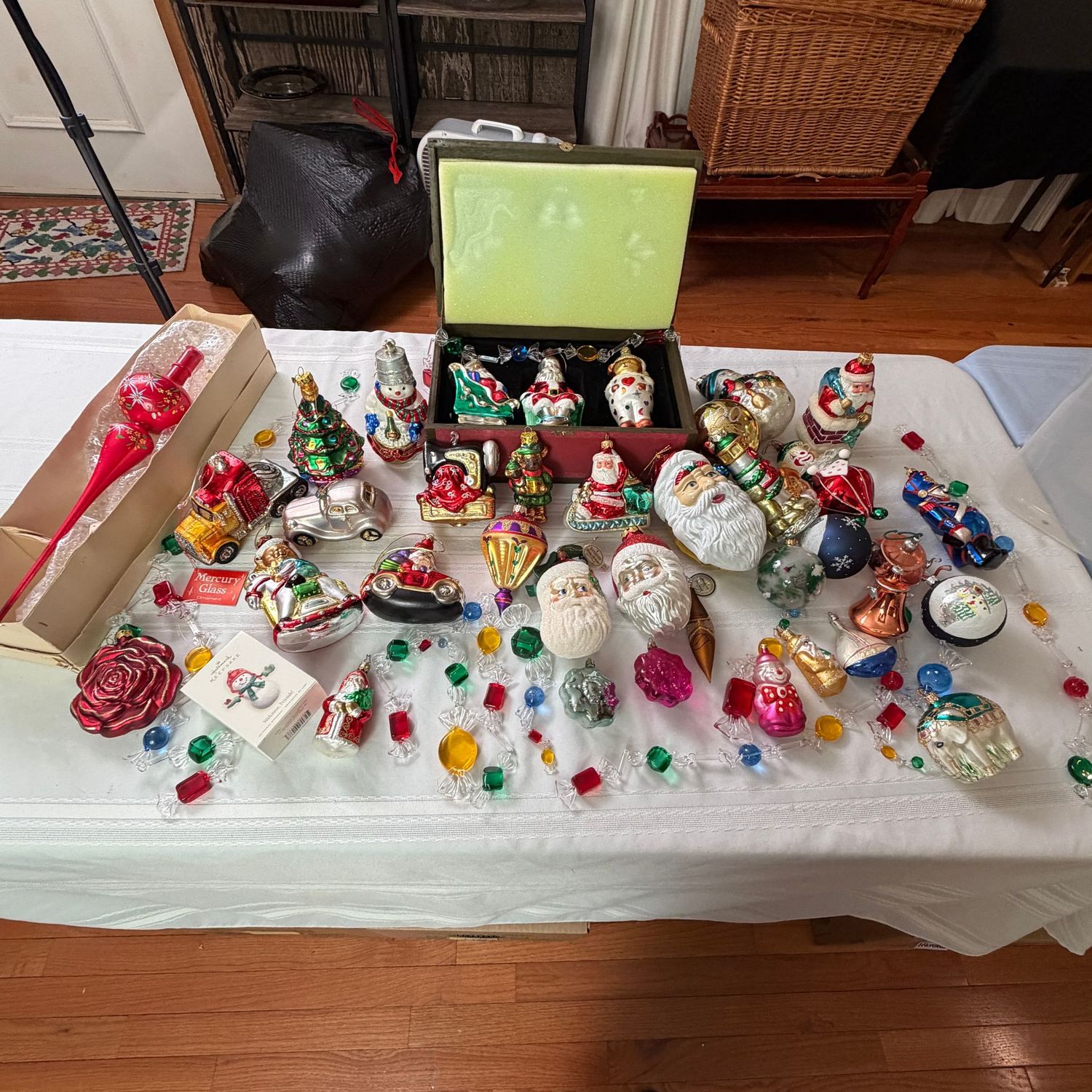 Large, clear, packed bin of mostly glass ornaments, large variety, plastic candy garland pieces, long red glass spire, lots of Santas, Waterford, Dept. 56, Poland, S1414