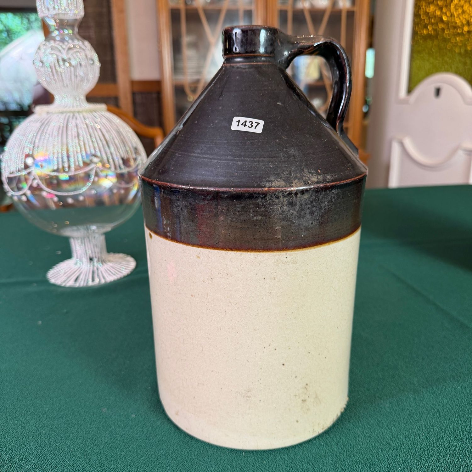 Brown and tan stoneware jug, 11 Brown and tan stoneware jug, 11"H, S1437