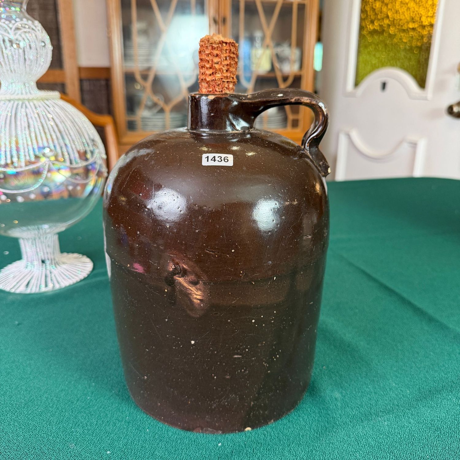Brown glazed jug with corncob plug, minor chips, 9 Brown glazed jug with corncob plug, minor chips, 9"H, S1436
