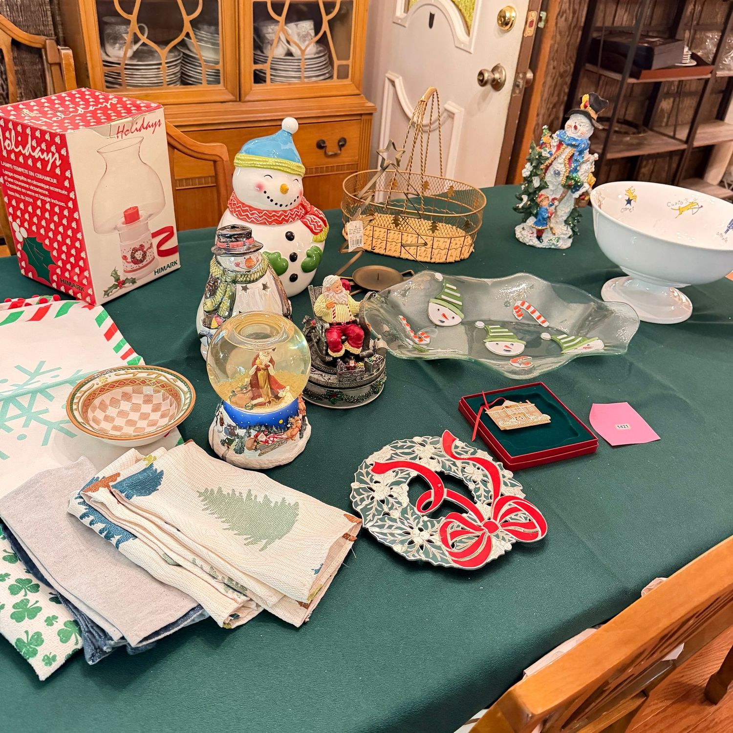 Large packed bin filled with Christmas towels, votive lantern, snowmen, Santas, trivet, Pottery Barn pedestal bowl & more, S1421 Large packed bin filled with Christmas towels, votive lantern, snowmen, Santas, trivet, Pottery Barn pedestal bowl & more, S1421