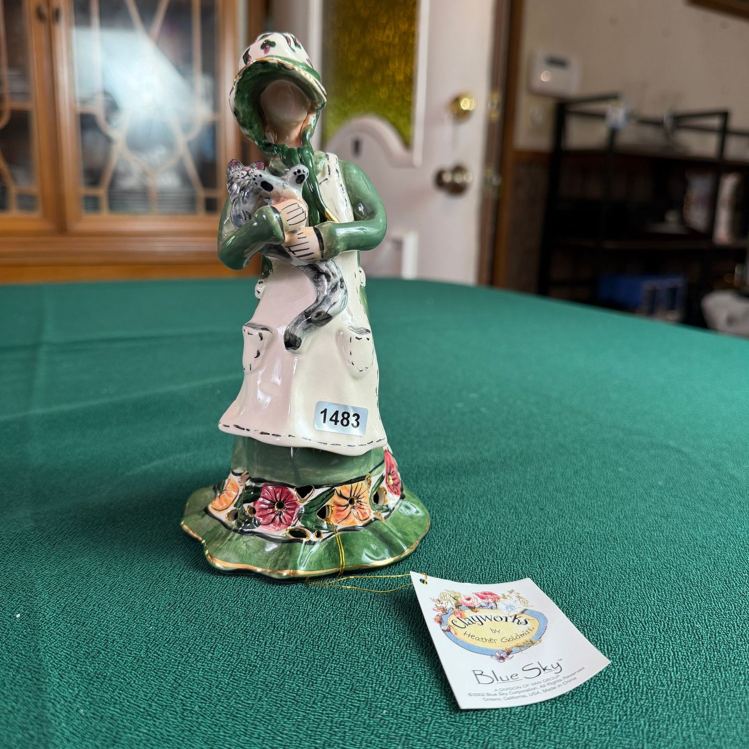 Blue Sky S1483 woman in green dress holding a grey cat, 7 Blue Sky S1483 woman in green dress holding a grey cat, 7"
