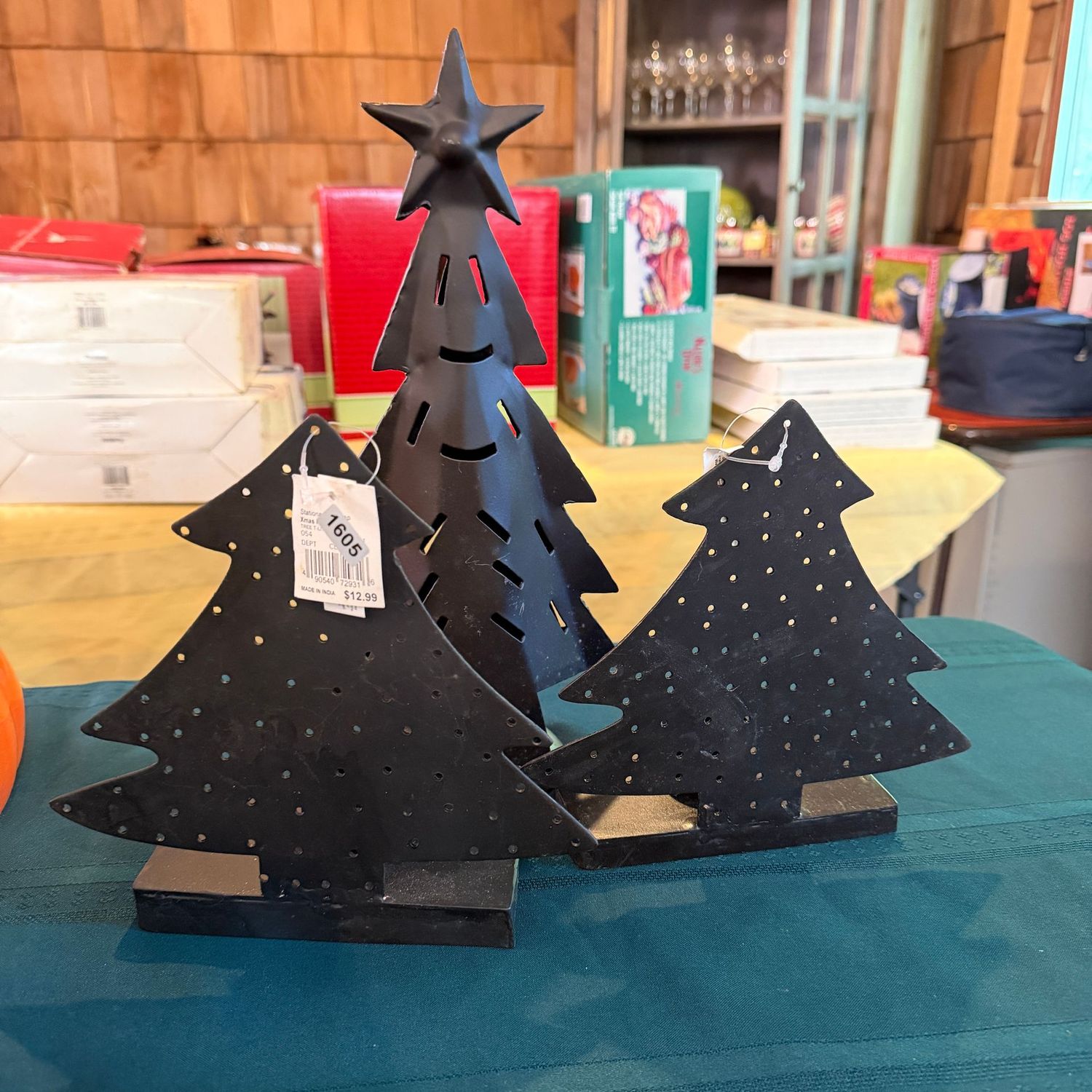 Trio of black metal Christmas trees, two are votive holders, the tallest is 13 Trio of black metal Christmas trees, two are votive holders, the tallest is 13", S1605