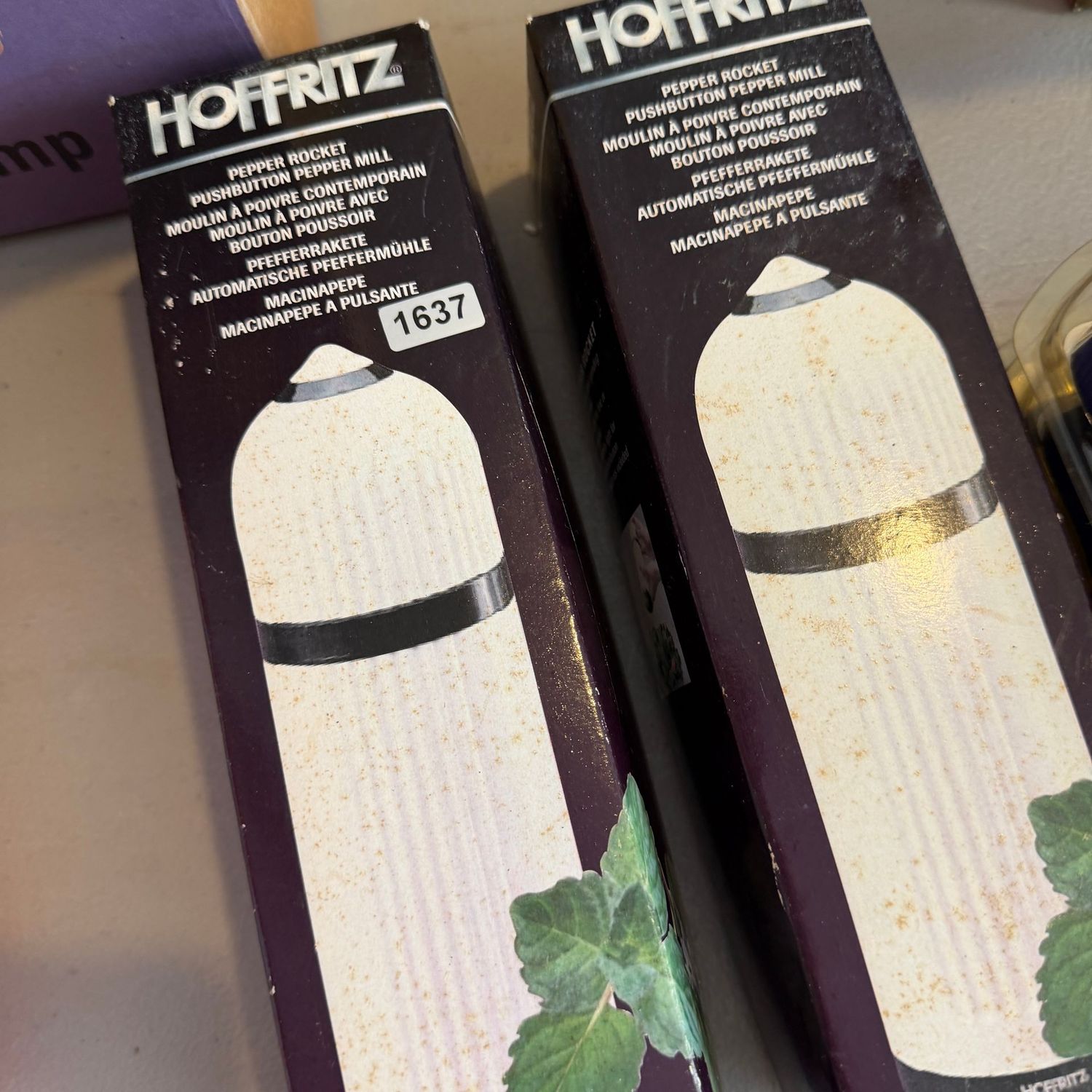 Two Hoffritz pepper rocket push-button pepper mills in box, S1637