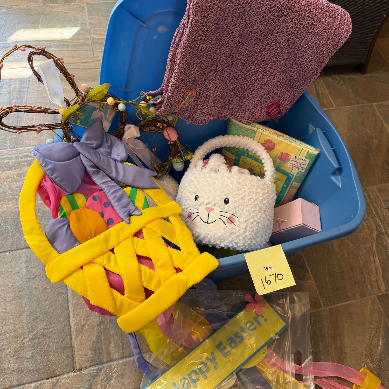 Blue bin with Easter decor, woven placemats, soft rabbit egg baskets, tablecloth, easter sign and basket banner & more, S1670
