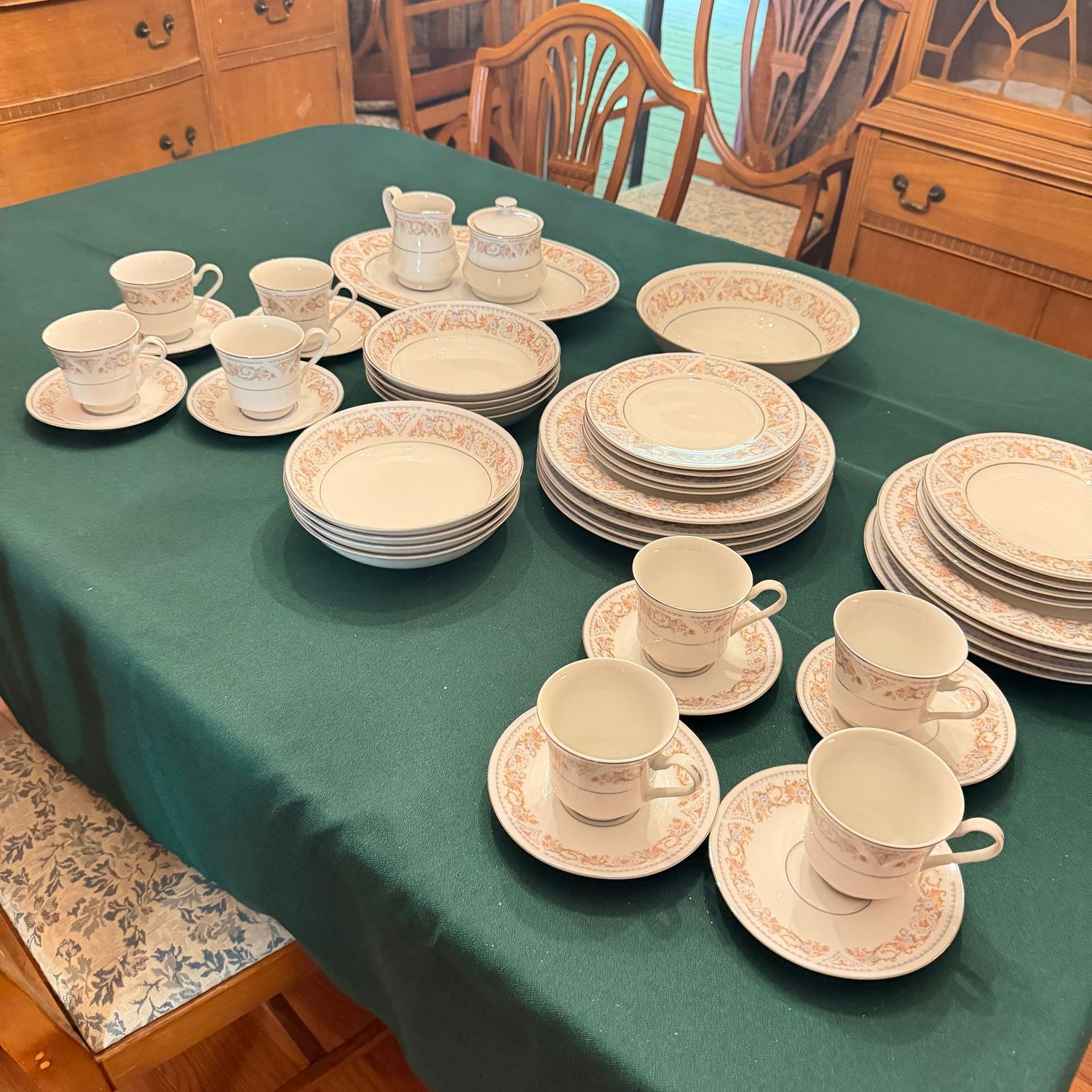 Large set of muted floral china, service for 8 Large set of muted floral china, service for 8