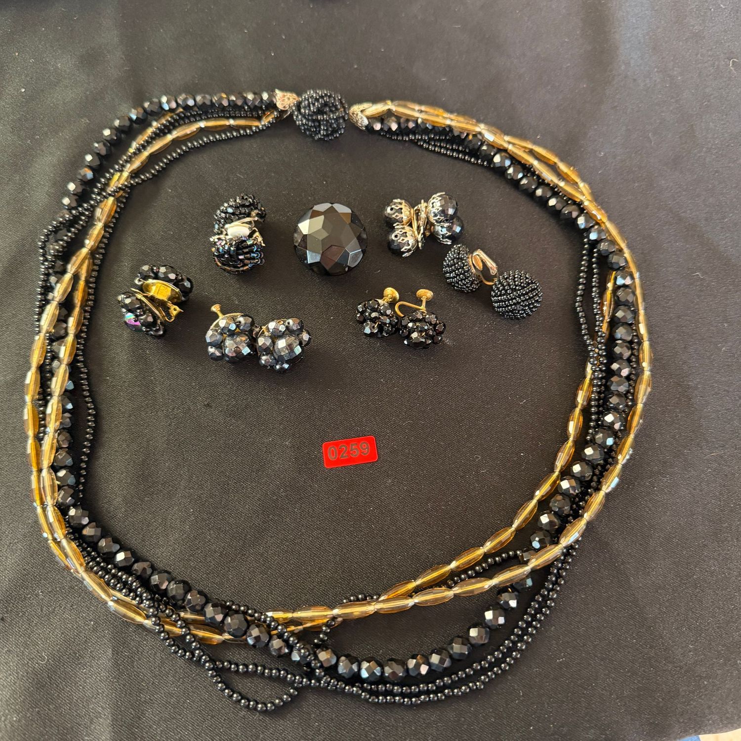 Jewelry Lot R0259 black and gold multi-strand necklace, black and iridescent beaded clip & screw-back earrings Jewelry Lot R0259 black and gold multi-strand necklace, black and iridescent beaded clip & screw-back earrings
