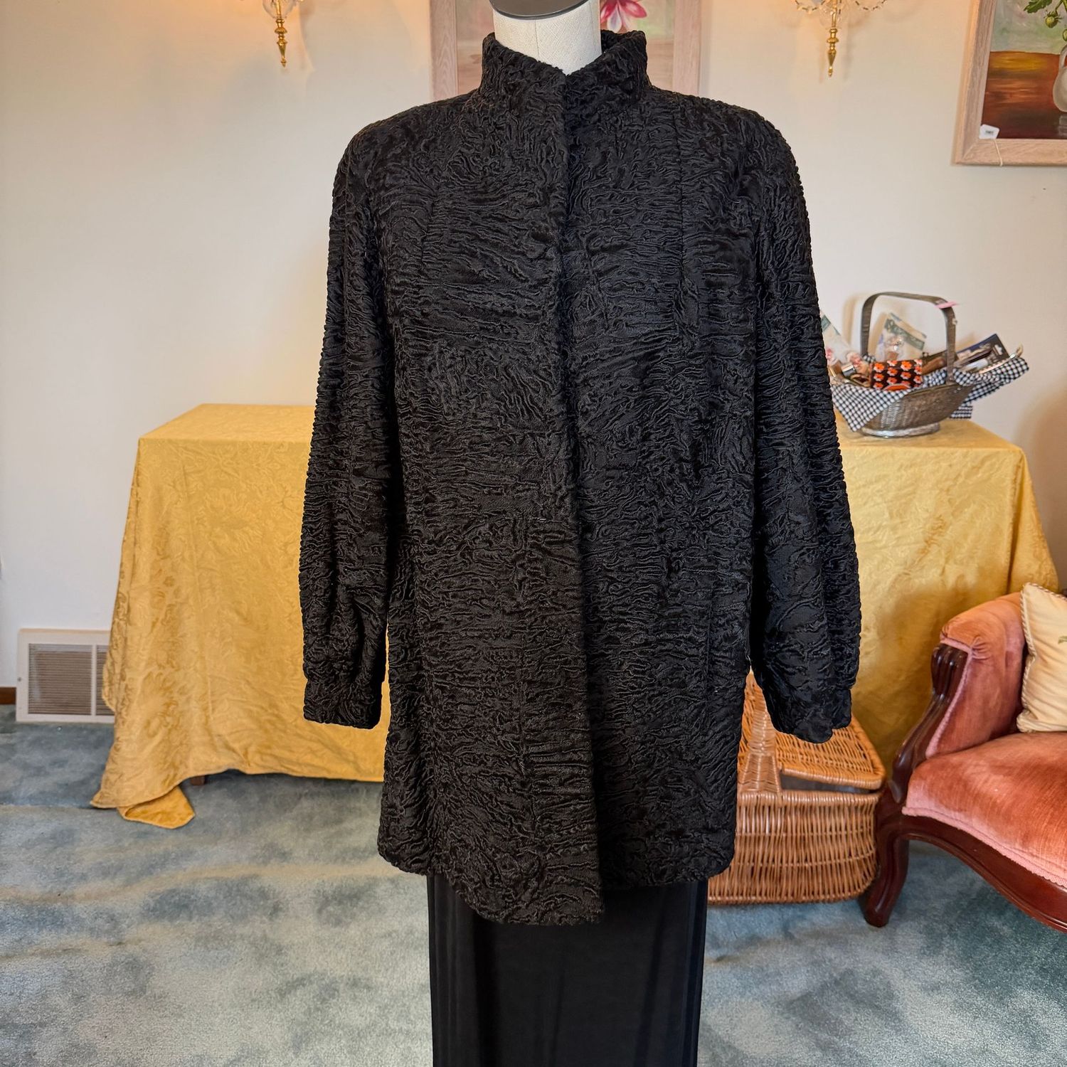 Swakara S.W. African Karakul Lamb coat from Steiger's, a few minor wear spots, under arms (across back) measures 18 Swakara S.W. African Karakul Lamb coat from Steiger's, a few minor wear spots, under arms (across back) measures 18" (est. 36" chest), under arm to wrist 16", S1785