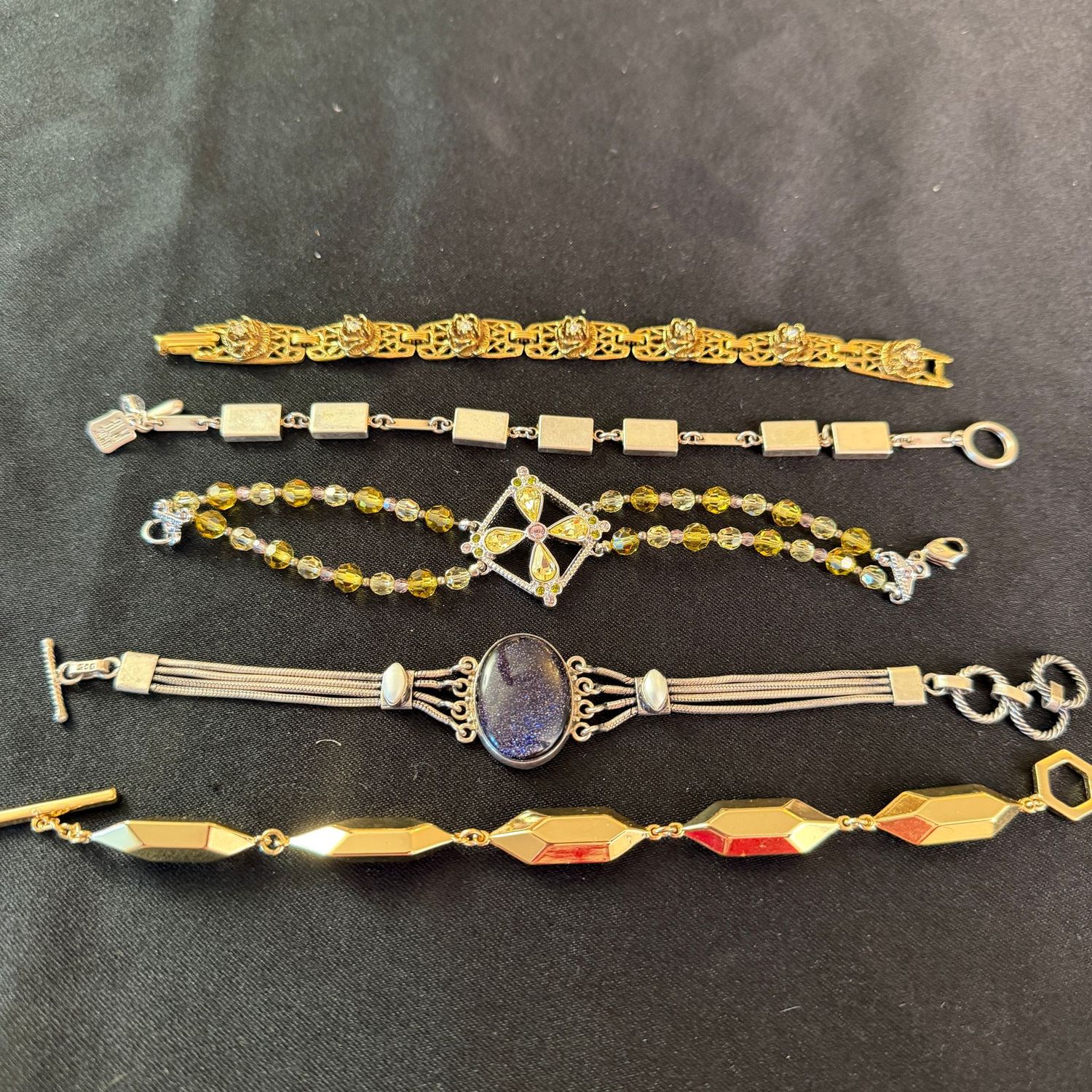 Jewelry Lot R0272 bracelets with RLM, sterling with blue stone, yellow and clear Swarovski Jewelry Lot R0272 bracelets with RLM, sterling with blue stone, yellow and clear Swarovski