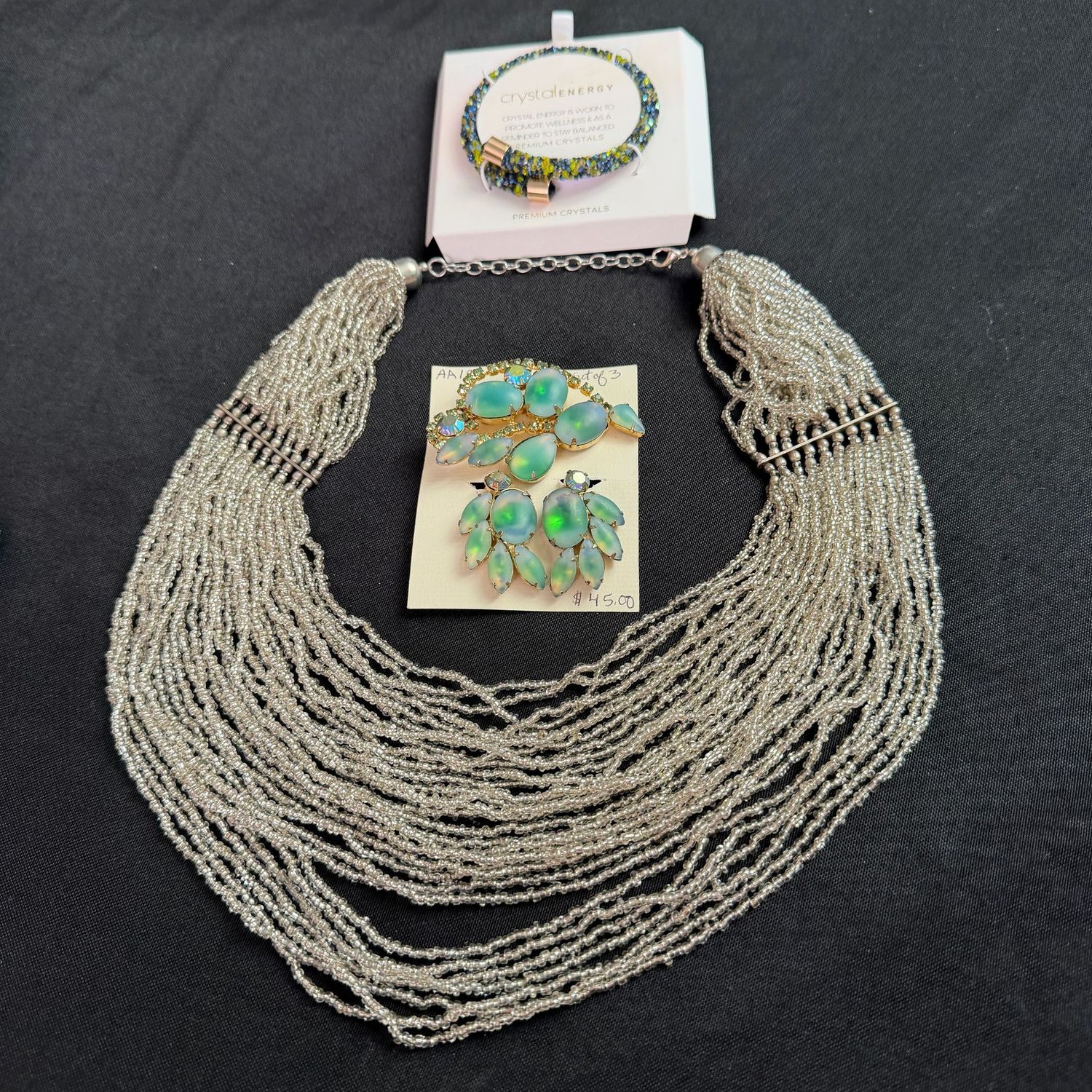 Jewelry Lot R0290 multistrand necklace, Crystal Energy bracelet, aurora borealis clip earrings and brooch set Jewelry Lot R0290 multistrand necklace, Crystal Energy bracelet, aurora borealis clip earrings and brooch set