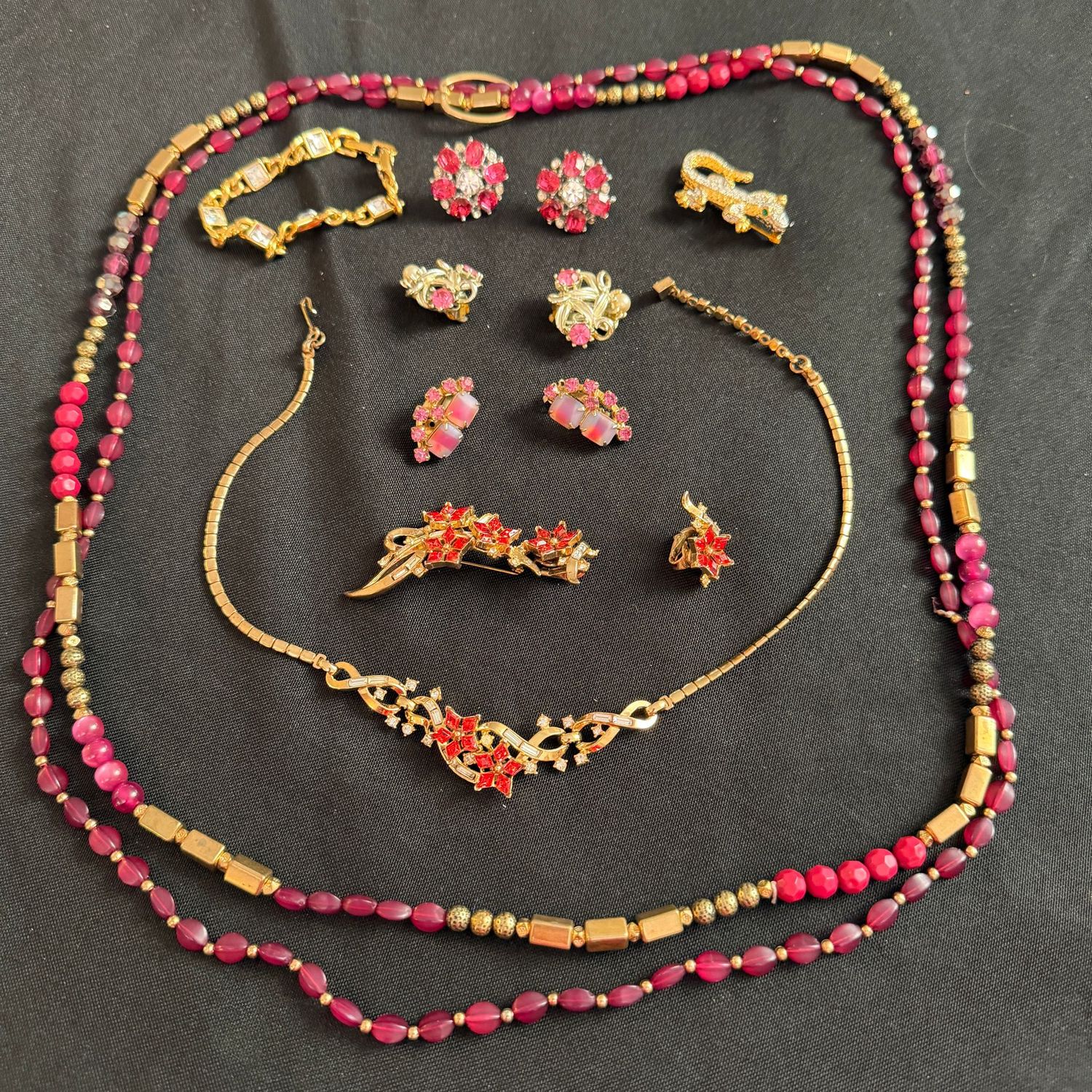 Jewelry Lot R0293 Gold-tone and pink lemonade necklace, pins, bracelet, and earrings, including Trifari