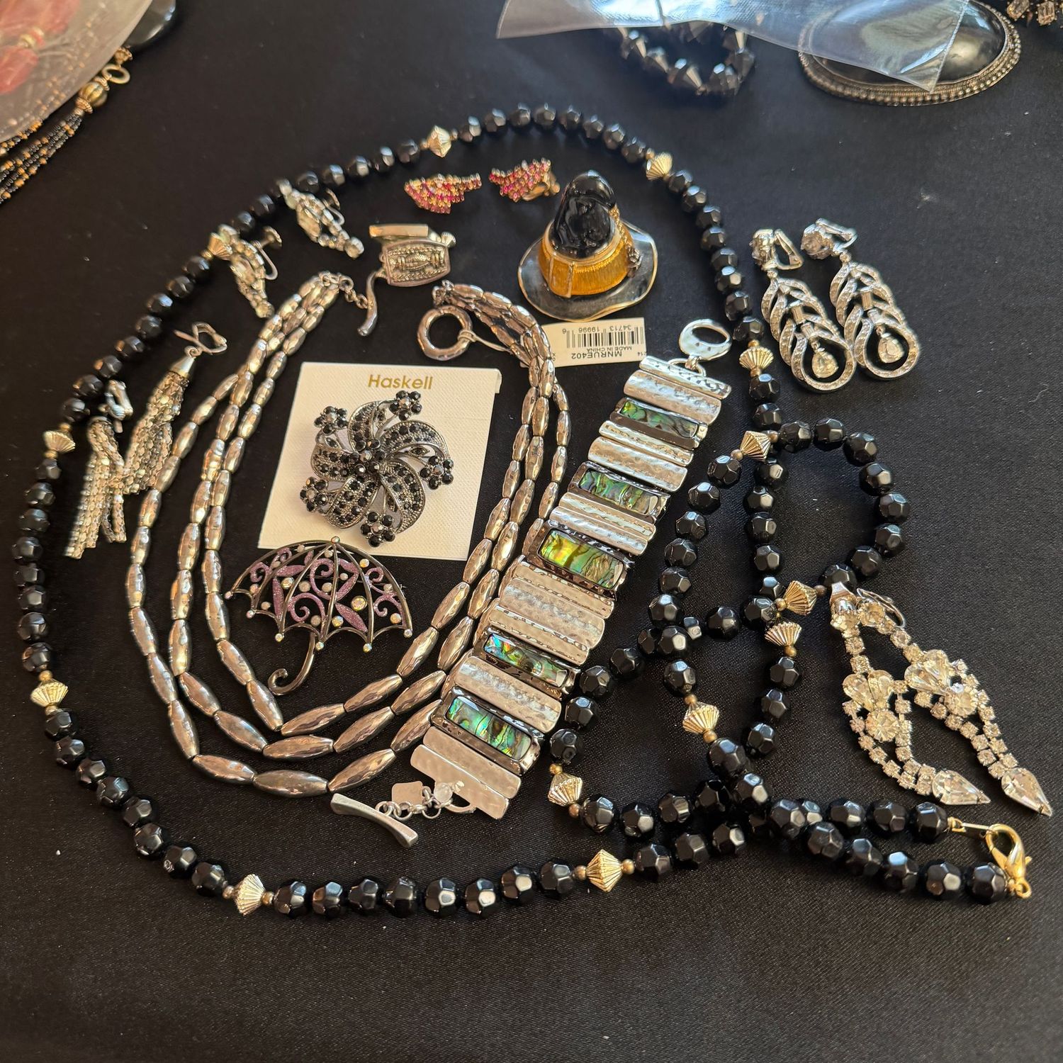 Jewelry Lot R0326 black and silver-tone with necklaces, rhinestone earrings, brooches, bracelet, Monet enameled witch's hat trinket box Jewelry Lot R0326 black and silver-tone with necklaces, rhinestone earrings, brooches, bracelet, Monet enameled witch's hat trinket box