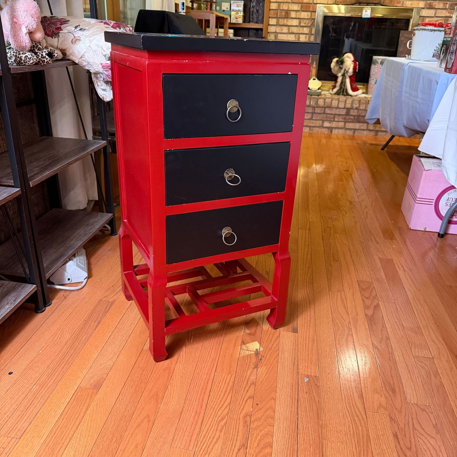 Red and black Chinoiserie table/chest with open-slat lower shelf, a few areas of chipping paint, 33"H x 16"W x 16"L, B0110