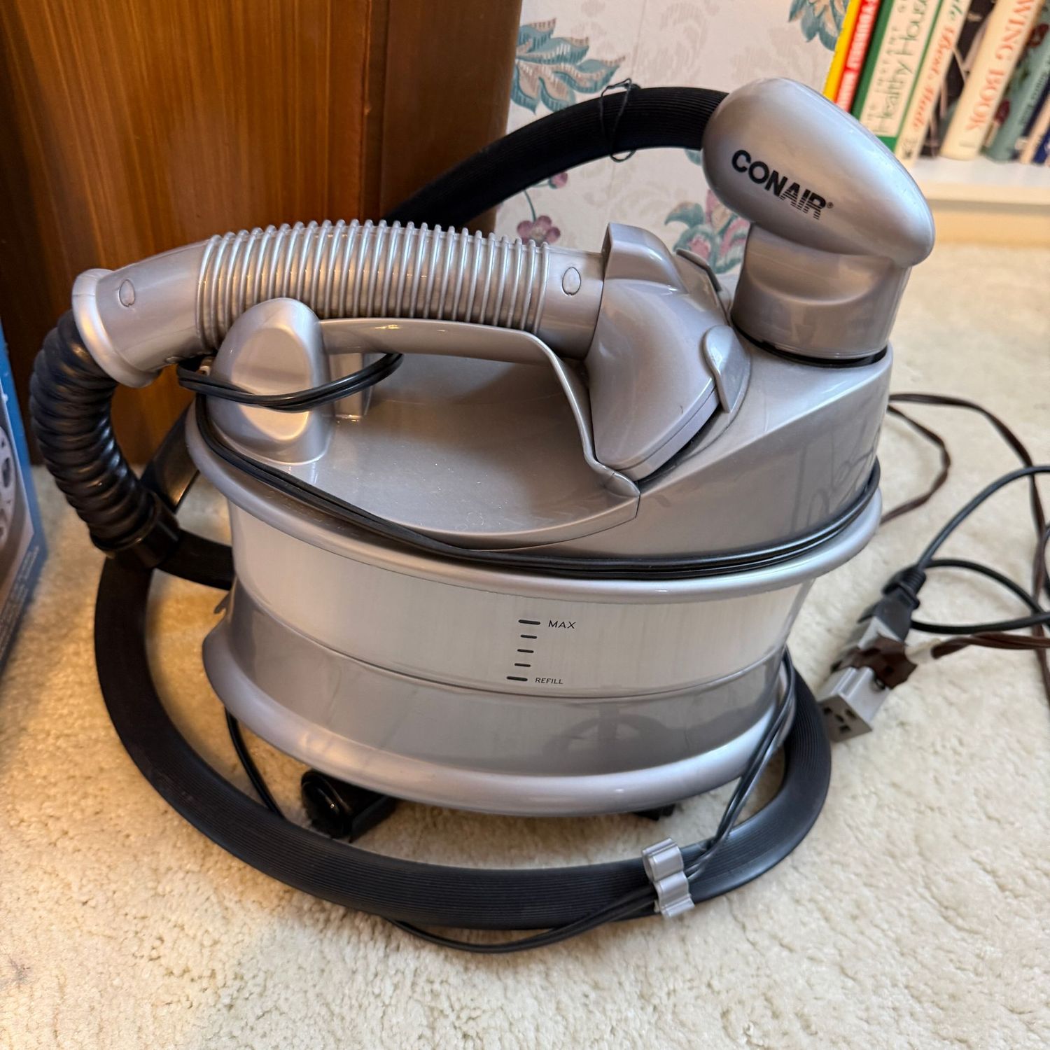 Grey Conair clothing steamer, works on initial test, on casters Grey Conair clothing steamer, works on initial test, on casters