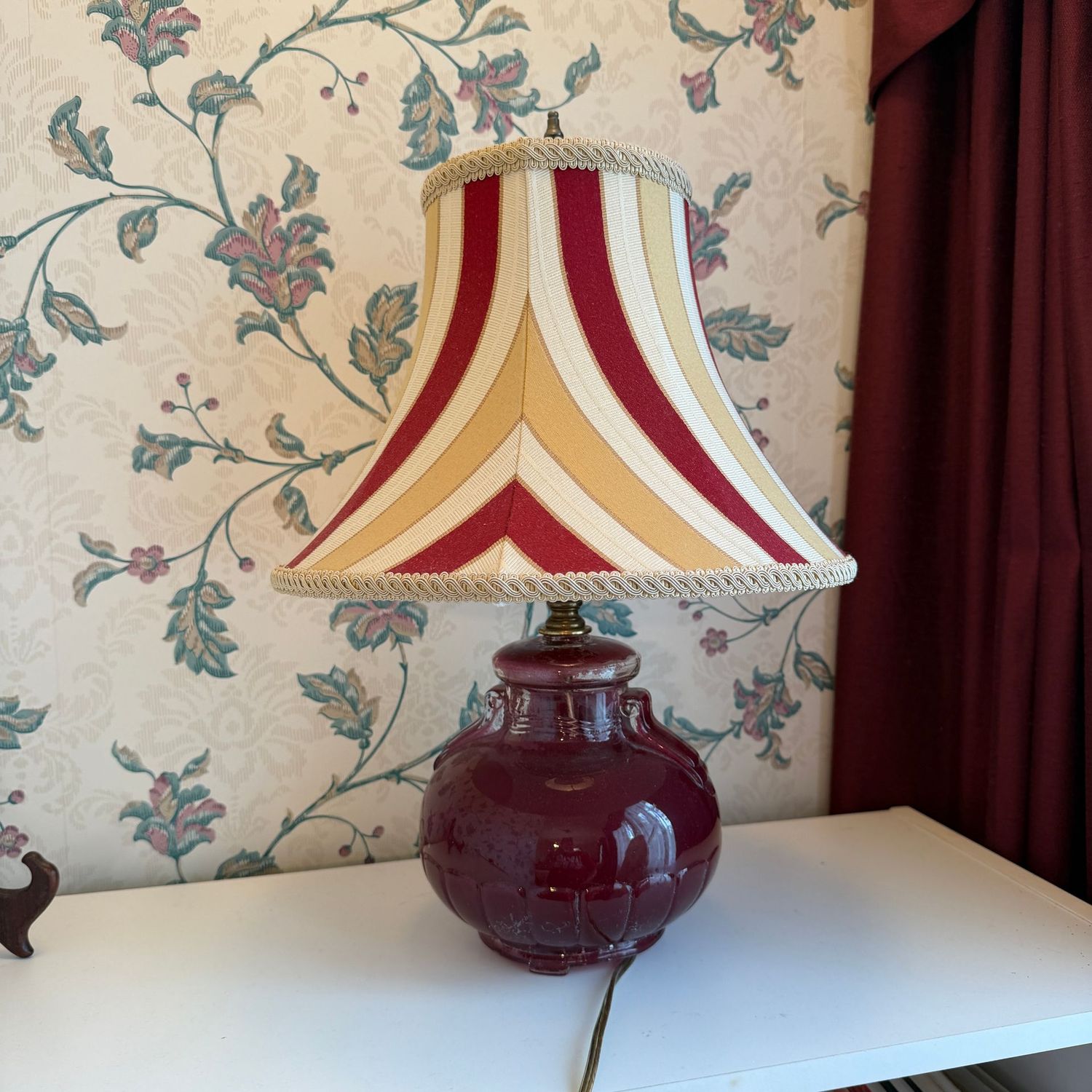 Reverse-painted glass lamp with maroon and cream shade, 16 Reverse-painted glass lamp with maroon and cream shade, 16"H