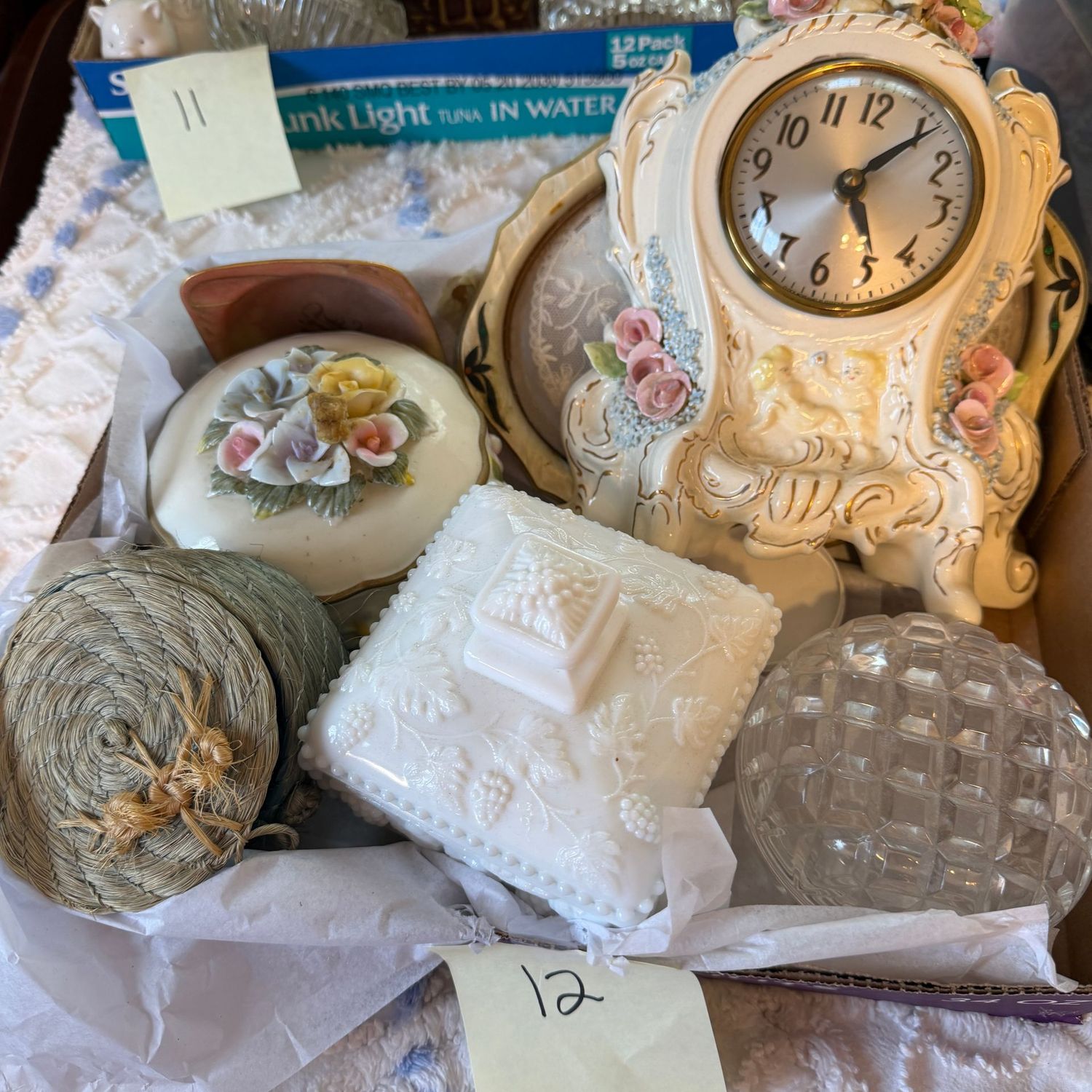Decorative Lot #12 coasters, clear and milk glass trinket box, floral porcelain trinket box, and clock (clock needs repair to workings) Decorative Lot #12 coasters, clear and milk glass trinket box, floral porcelain trinket box, and clock (clock needs repair to workings)