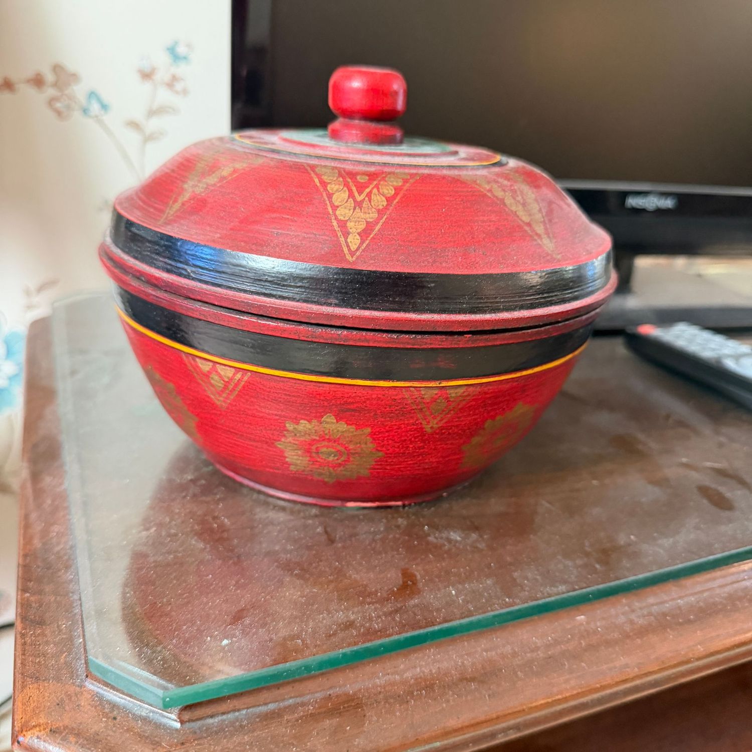 Decorative round wooden trinket box, red and black with gold pattern, 7 Decorative round wooden trinket box, red and black with gold pattern, 7"W