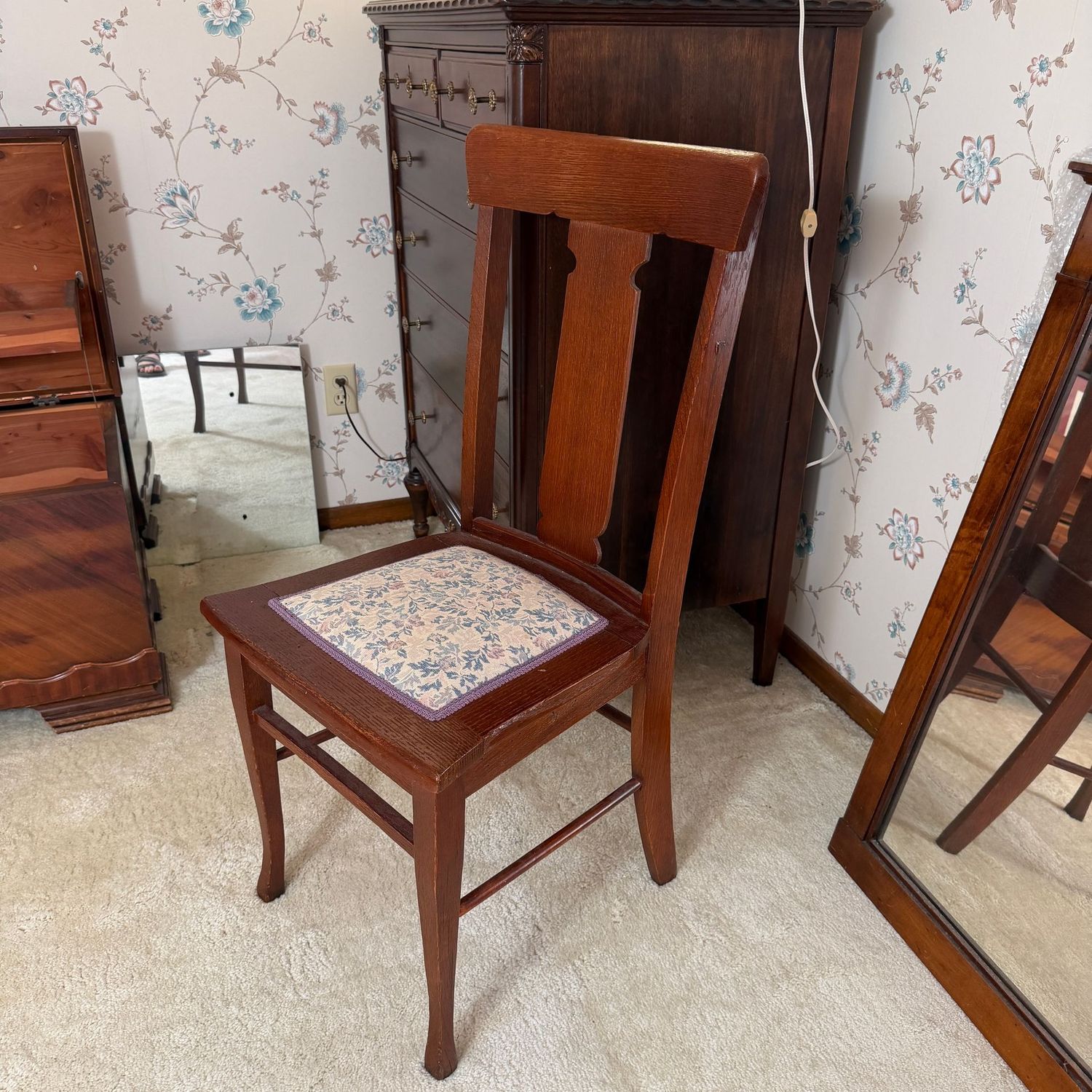 Oak slat-back chair with floral seat, 38 Oak slat-back chair with floral seat, 38"H x 16"W