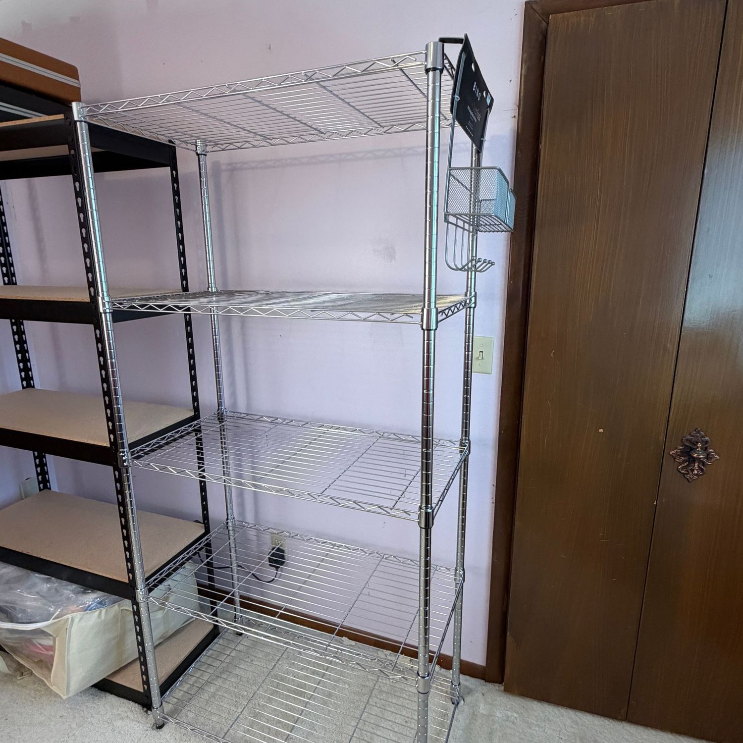 Tall chrome wire shelf with extra over-the door organizer (This item is upstairs) 72 Tall chrome wire shelf with extra over-the door organizer (This item is upstairs) 72"H x 18"D x 35"L