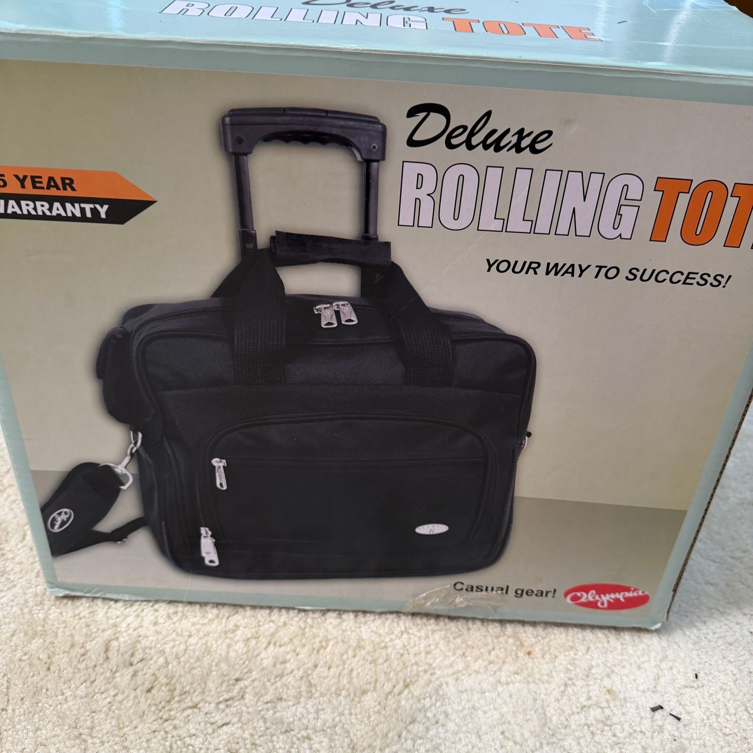 Duluxe 'blue' rolling tote large padded briefcase in box, 17 Duluxe 'blue' rolling tote large padded briefcase in box, 17" x 13.5" x 7"
