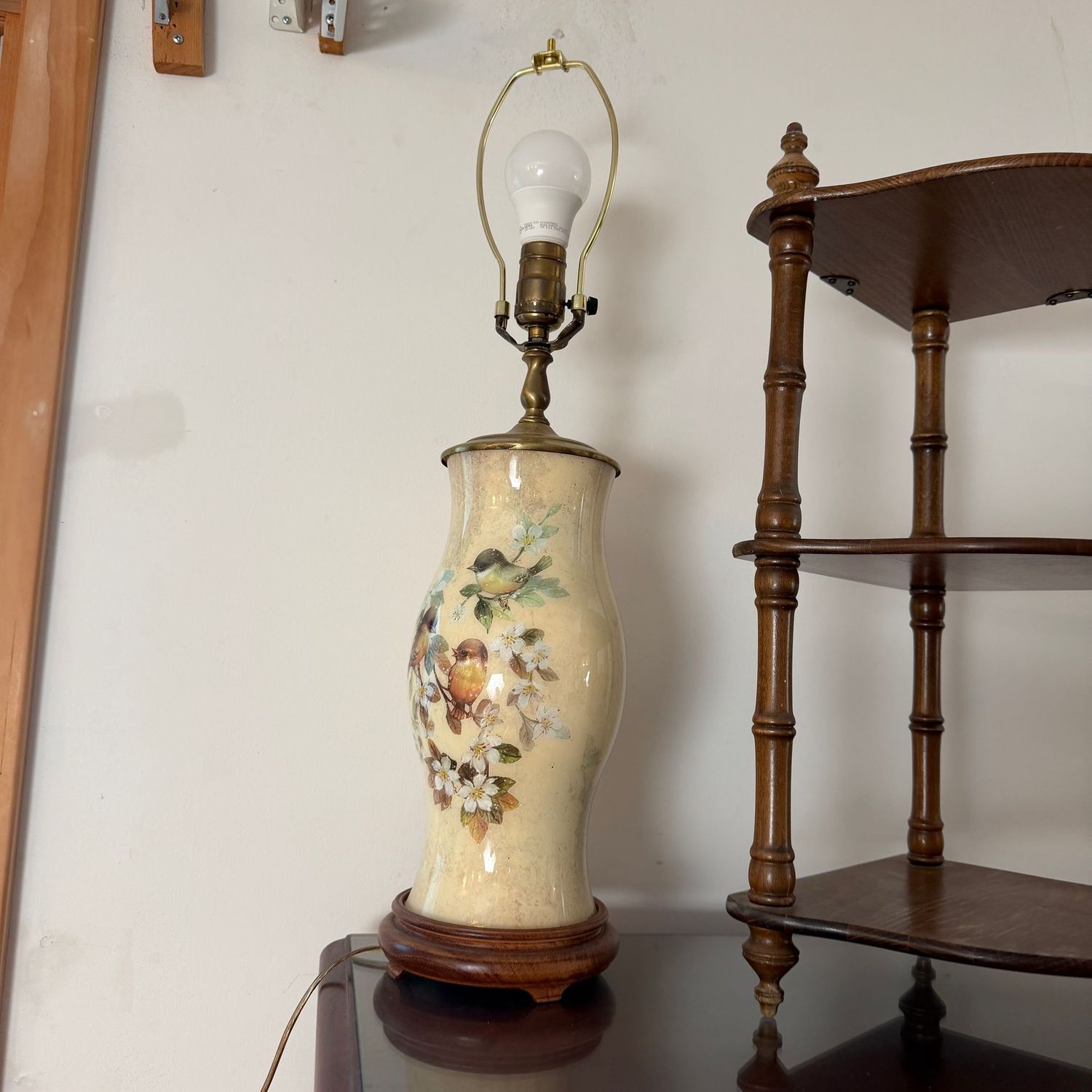 Vintage hand-decorated ceramic table lamp with small birds resting on a blossoming tree branch, 26"H