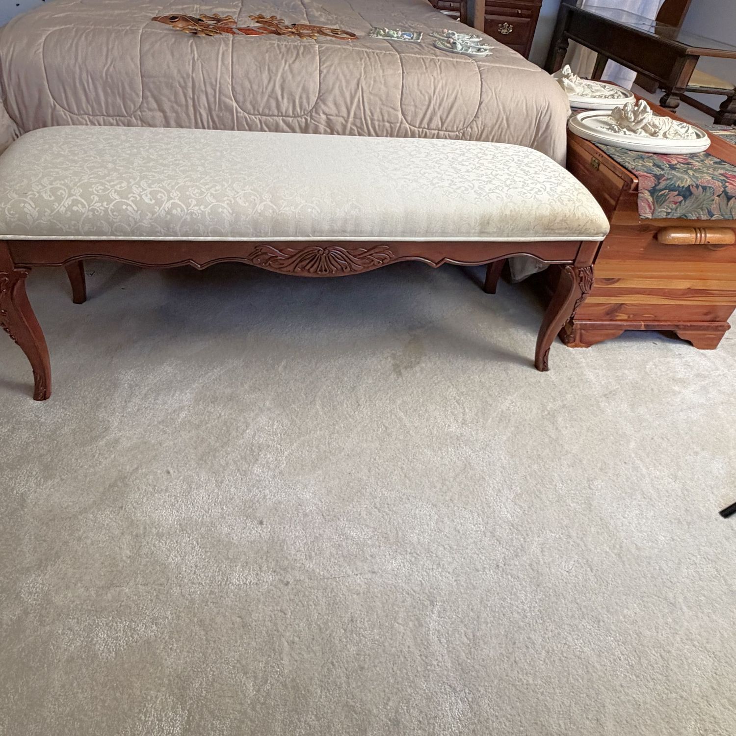 Long ornately-carved bench seat with brocade upholstery by Legacy Classic Furniture, thick firm cushion, 18"H x 52"L x 18"D (Item is upstairs)