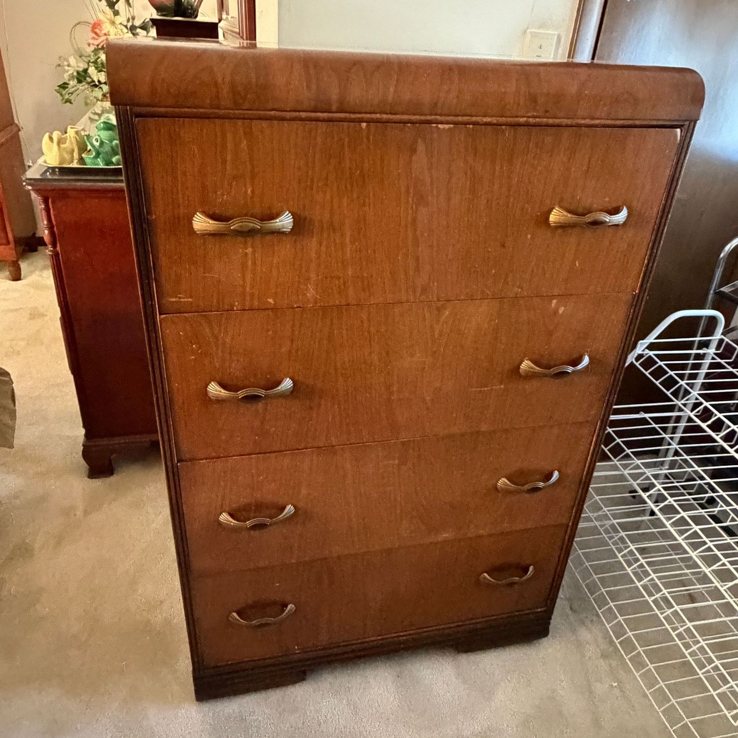 Vintage 4-drawer dresser chest with curved top and bowtie drawer pulls,  some wear to finish, drawers open easily, 46"H x 18"D x 30"W