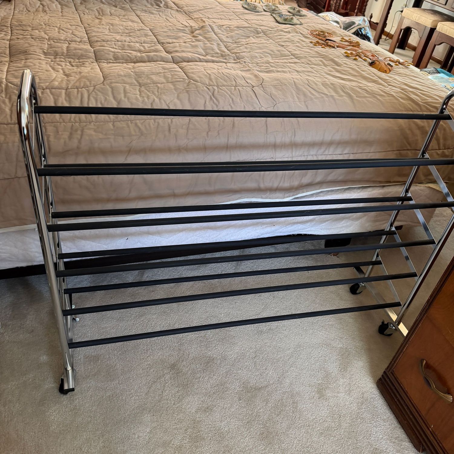 Chrome long shoe organizer shelf on casters, 44 Chrome long shoe organizer shelf on casters, 44"L x 32"H