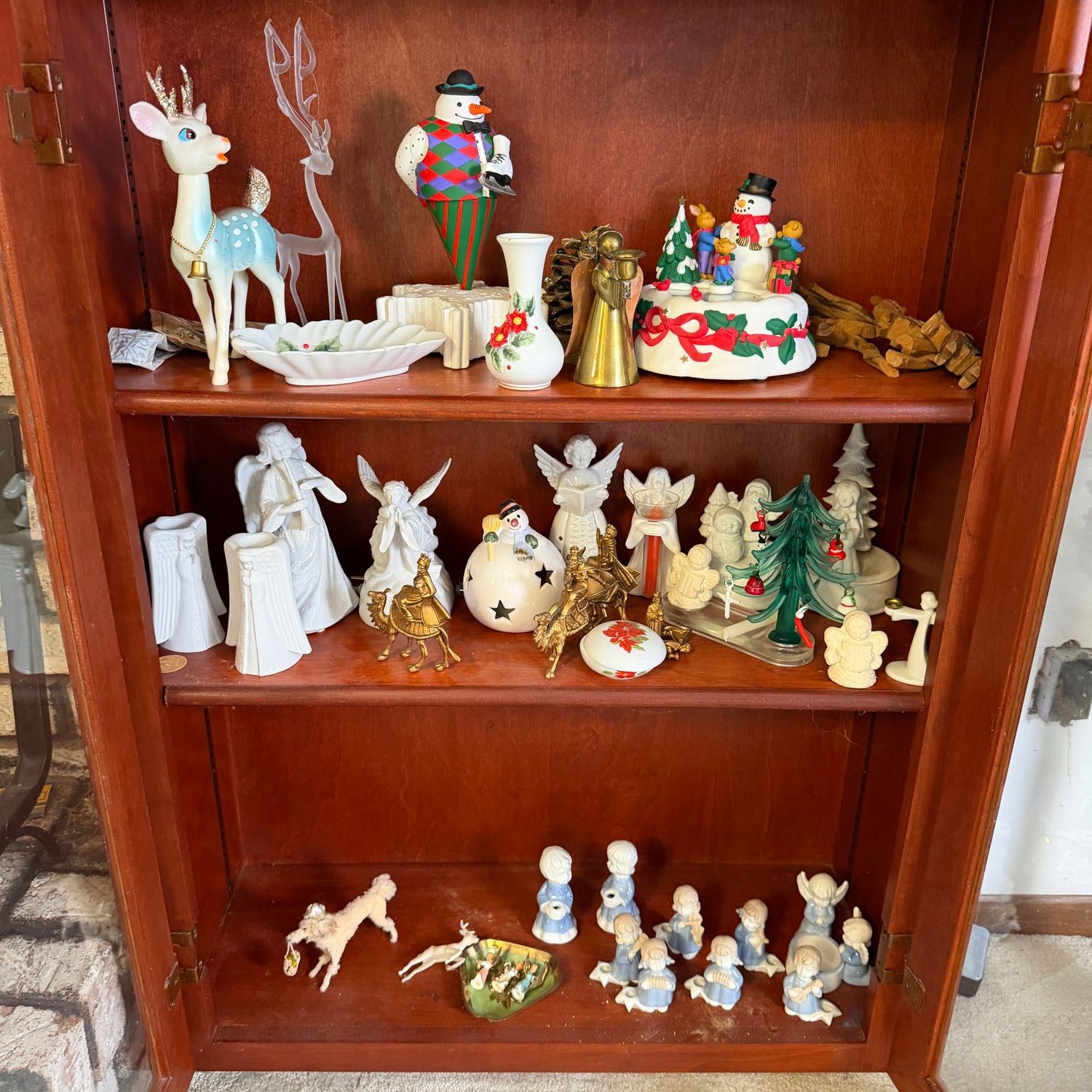 Three shelves of classic and vintage Christmas decorations, all 2-8 Three shelves of classic and vintage Christmas decorations, all 2-8", music box, candle holders, angels