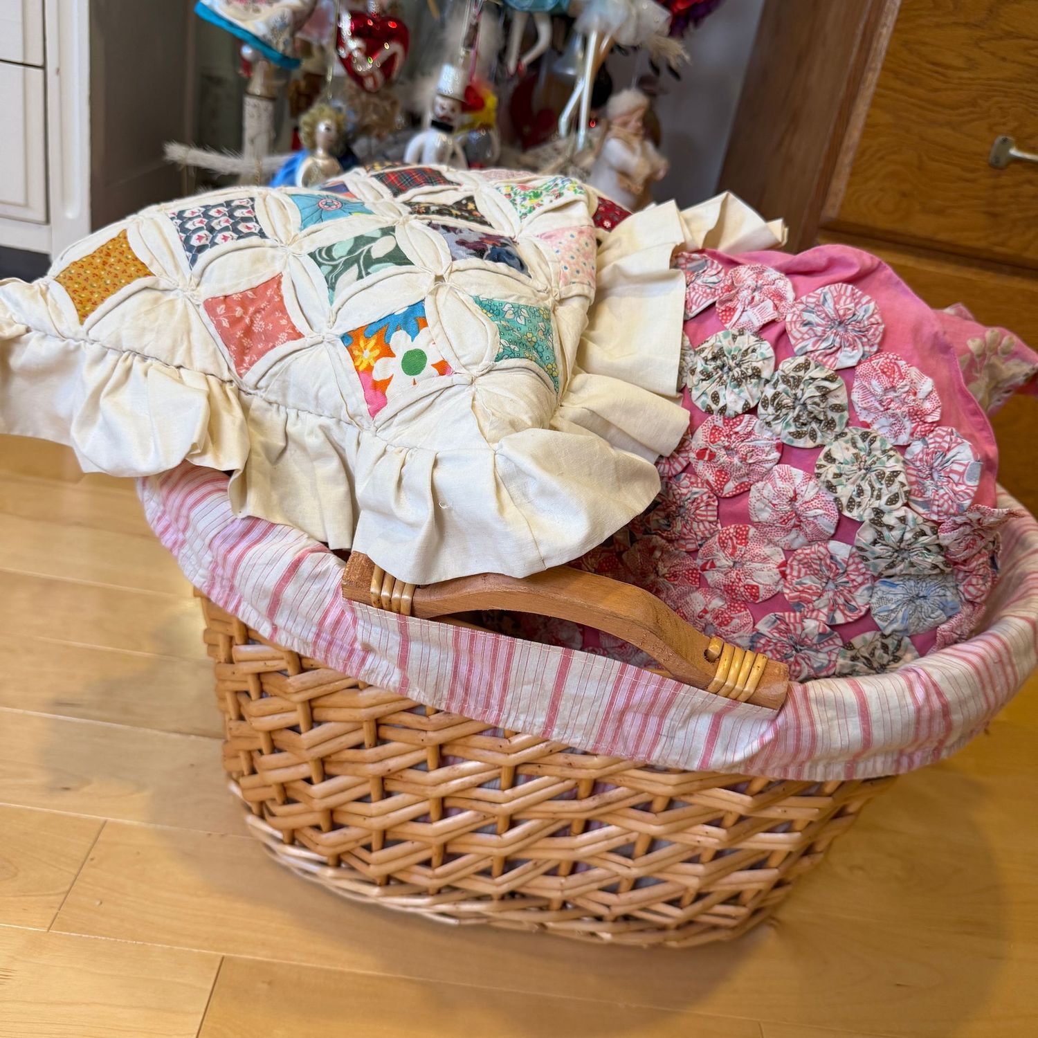 Pretty woven basket with vintage pillow, basket is 19 Pretty woven basket with vintage pillow, basket is 19"W