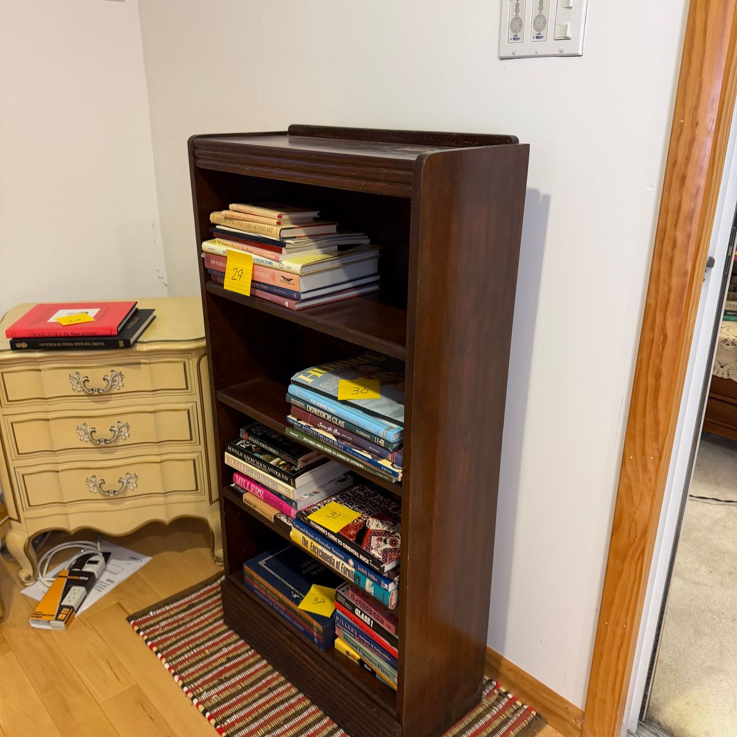 Mahogany bookshelf, mild wear, a few scratches (mostly on top) 46 Mahogany bookshelf, mild wear, a few scratches (mostly on top) 46"H x 24"W x 10"D (this item is heavy and upstairs)