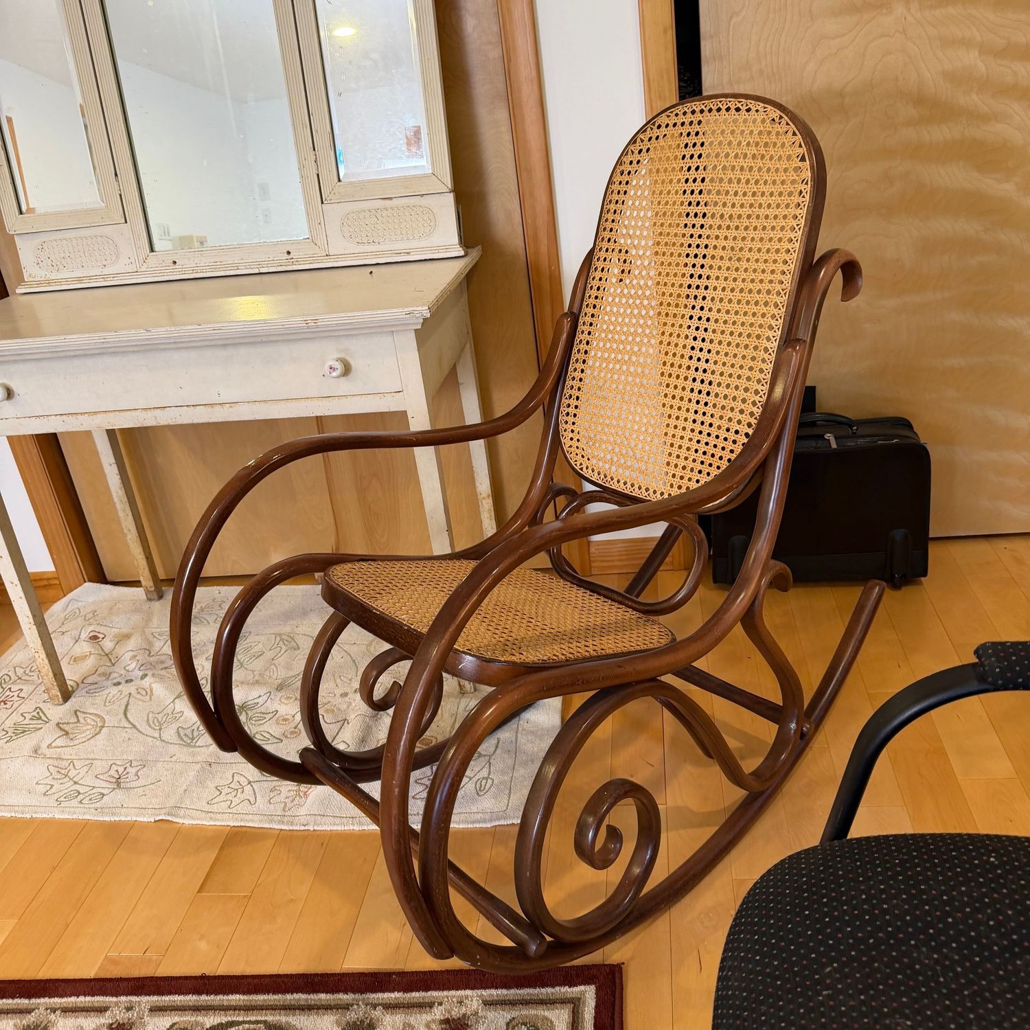 Bentwood rocker, elegant Thonet-style design and construction, 40 Bentwood rocker, elegant Thonet-style design and construction, 40"H x 20"W, this item is heavy and upstairs