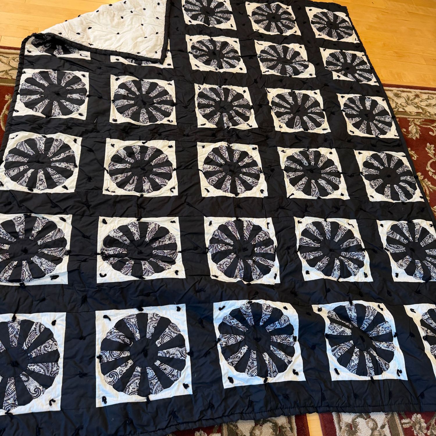 Dresden plate quilt, black and white, full-size, appears hand-made, has a minor cleanable spot on the underside, 7'8 Dresden plate quilt, black and white, full-size, appears hand-made, has a minor cleanable spot on the underside, 7'8" x 5'10"