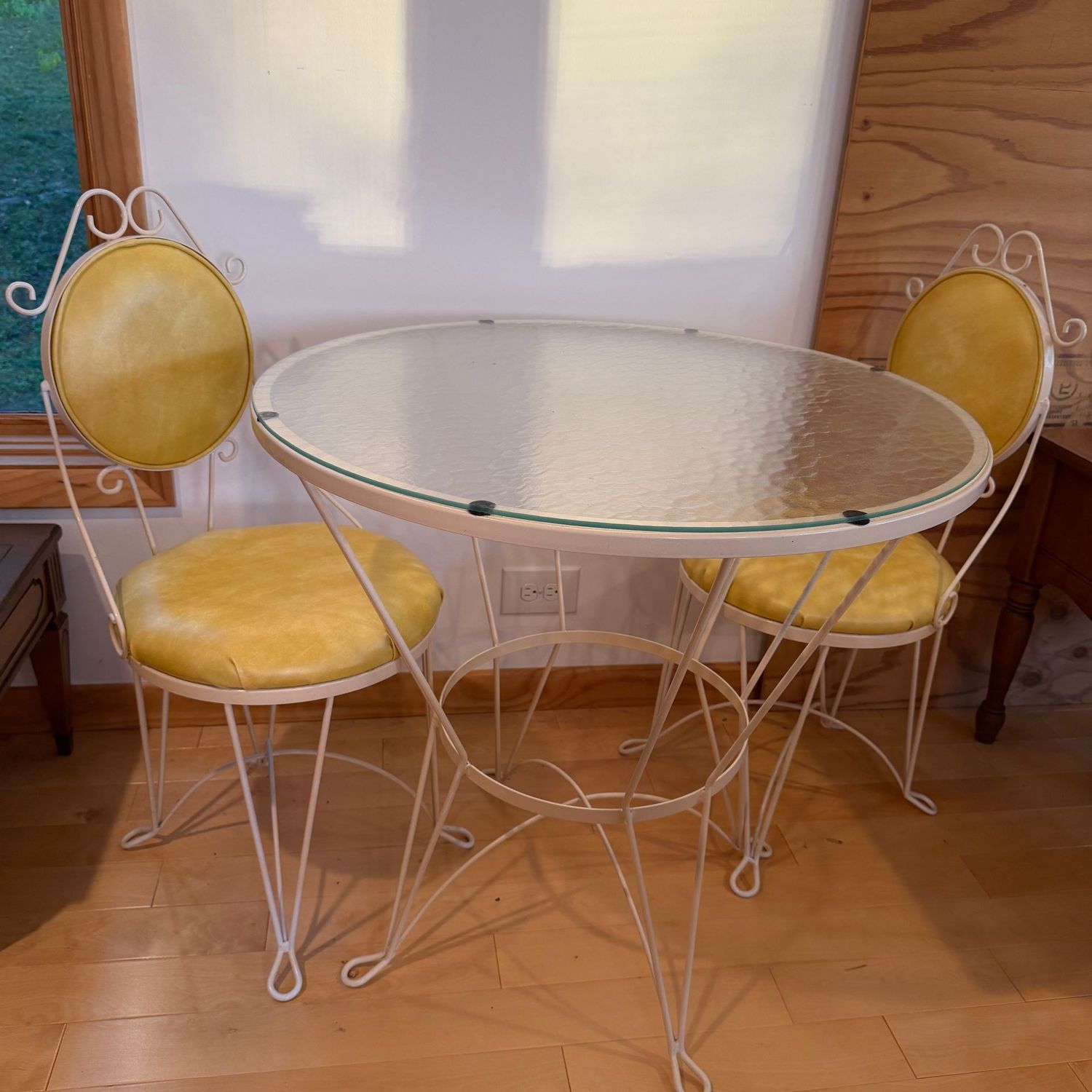Vintage ivory iron bistro chairs and table set, wonderful condition, yellow vinyl seats and back, marbled glass top, 29 Vintage ivory iron bistro chairs and table set, wonderful condition, yellow vinyl seats and back, marbled glass top, 29"W table, 14"W seats