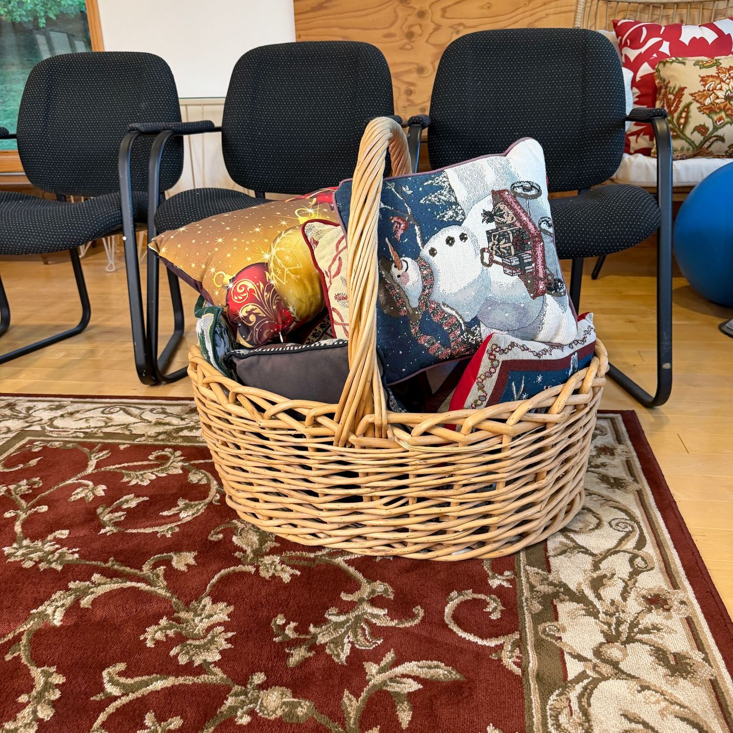 Monumental basket with Christmas throw pillows, basket is 27 Monumental basket with Christmas throw pillows, basket is 27"L
