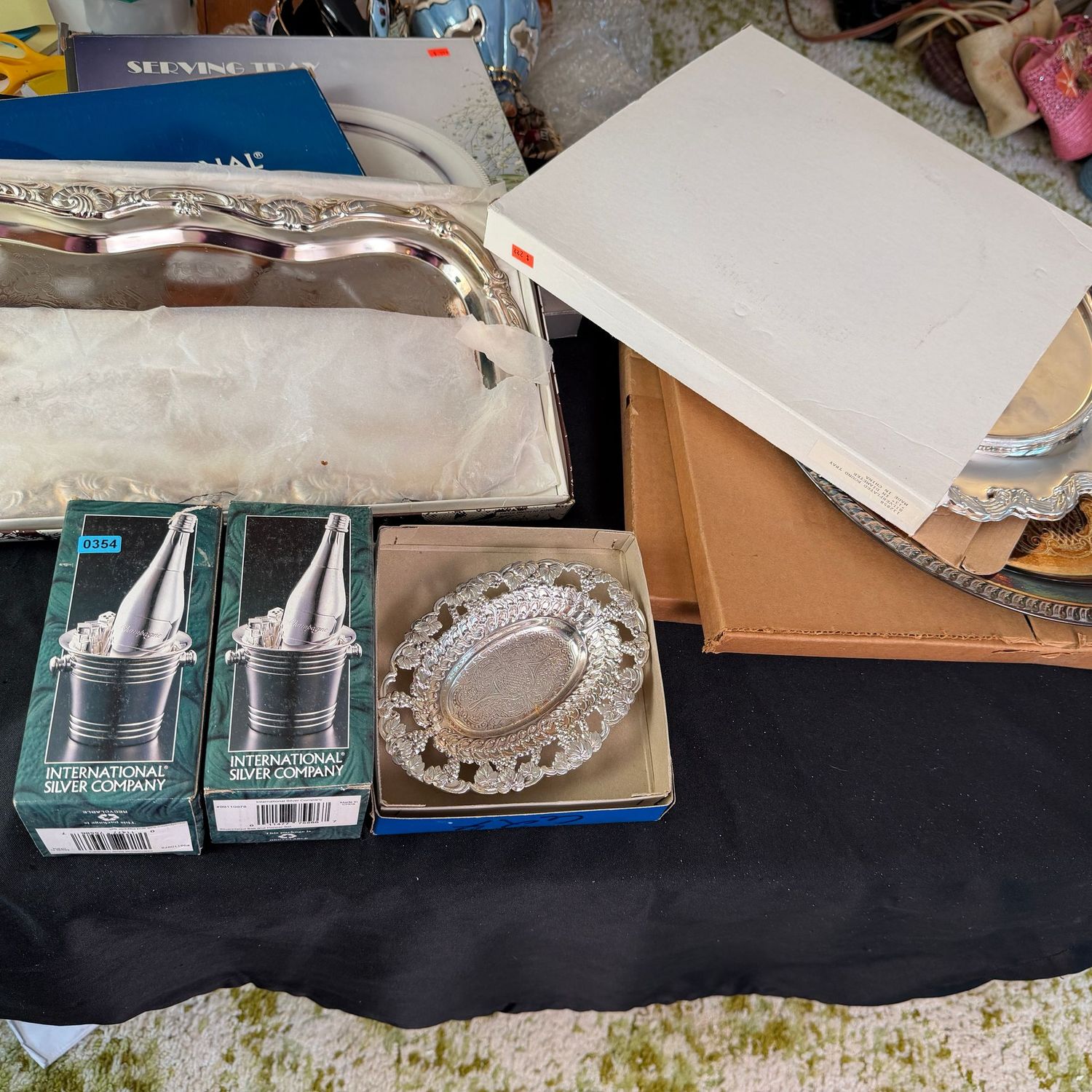 Group of silver-plated serving pieces, with trays up to 14 Group of silver-plated serving pieces, with trays up to 14"L, B0354