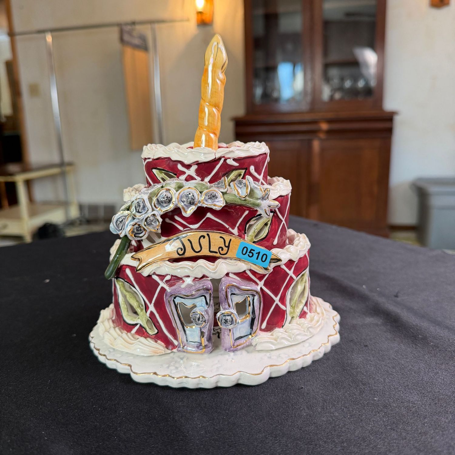Blue Sky B0510 July Birthday Cake, minor flaw in firing on top (see photo), 7'H