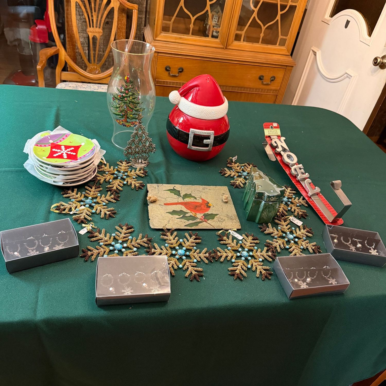 Group of Christmas decor with bulb-shaped dessert plates, candle chimney, wreath hanger, wine glass rings, snowflake ornaments, cardinal slate, Harry & David cookie jar, B0528 Group of Christmas decor with bulb-shaped dessert plates, candle chimney, wreath hanger, wine glass rings, snowflake ornaments, cardinal slate, Harry & David cookie jar, B0528