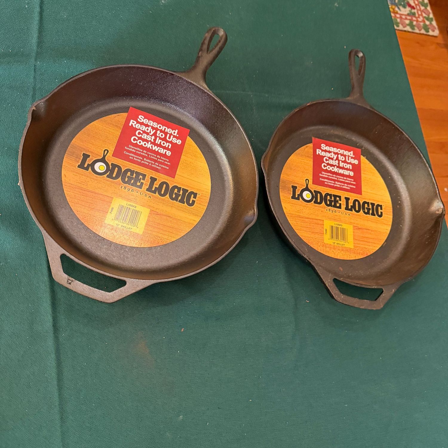 Pair of Lodge logic 12 Pair of Lodge logic 12" cast iron skillets, B0596