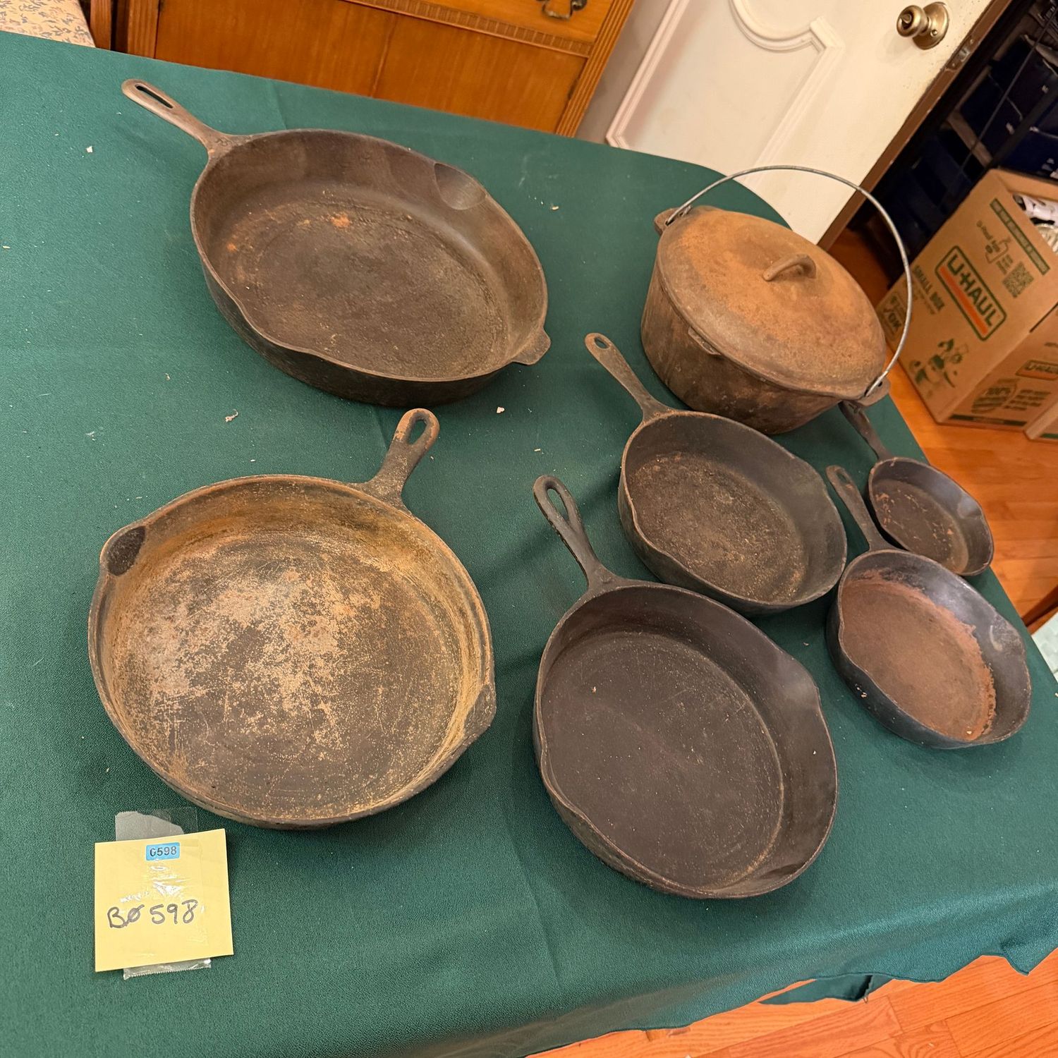 Large lot of vintage cast iron pans, in need of cleaning and seasoning, up to 14 Large lot of vintage cast iron pans, in need of cleaning and seasoning, up to 14", B0598