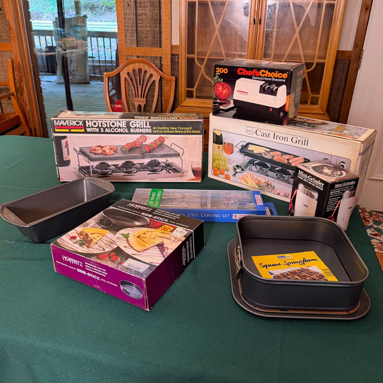 Kitchen box lot B0691 large tote with mini grills, loaf and springform pans, coffee grinder