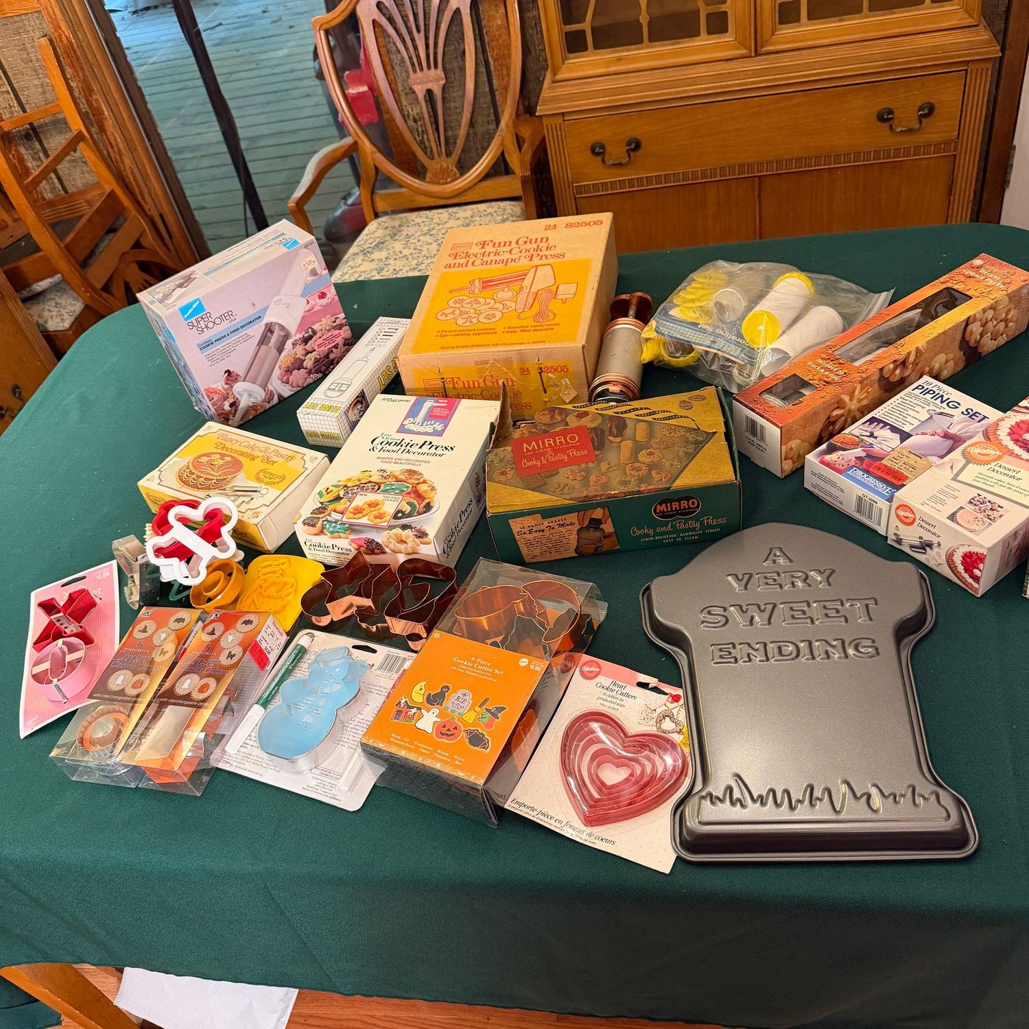 Kitchen box lot B0693 cookie cutters, Halloween cake pan, cookie presses, including the vintage Mirro pastry press