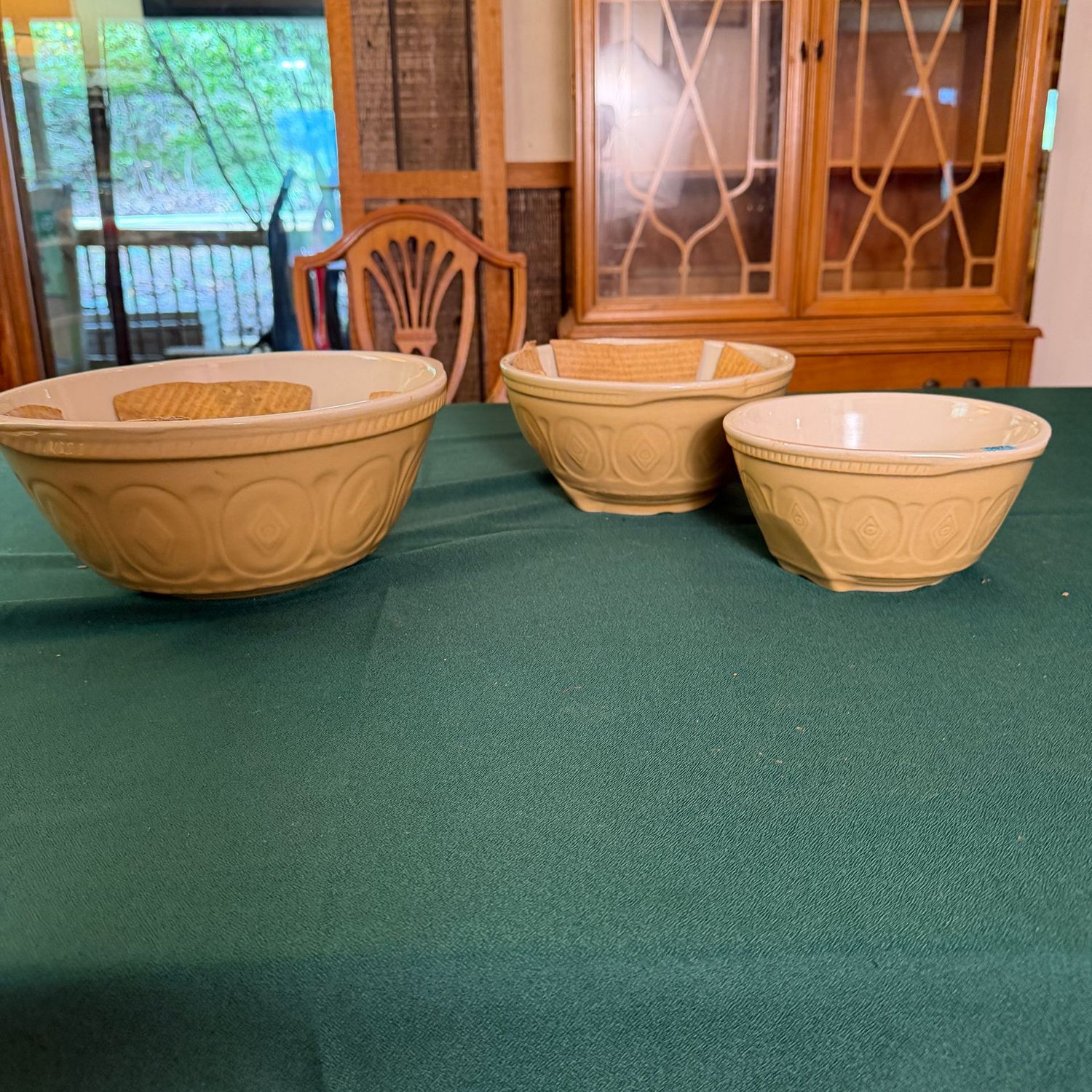 Three cream and white stoneware nesting bowls, up to 10 Three cream and white stoneware nesting bowls, up to 10", B0671