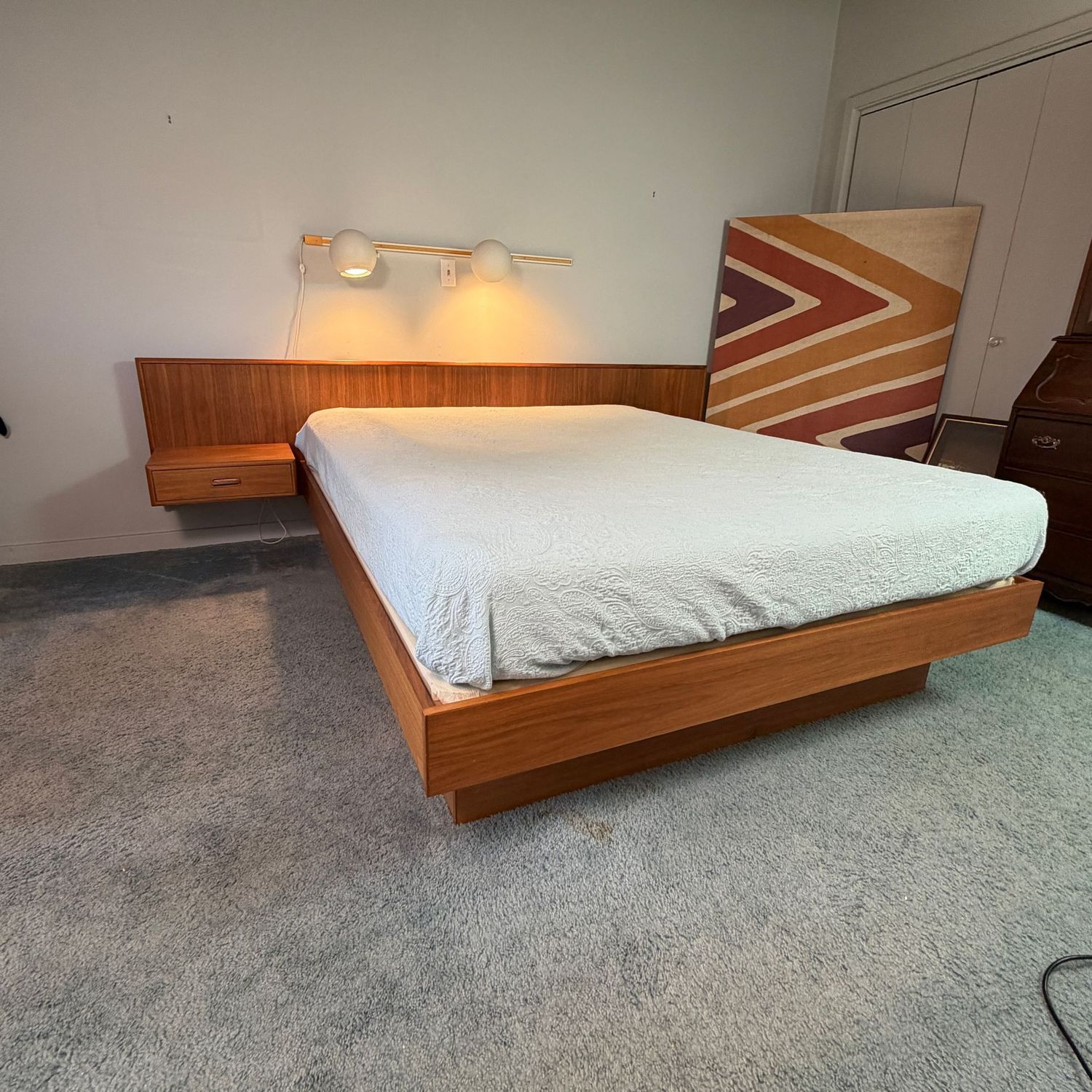 Vintage teak queen-size floating platform bed frame, plastic drawer pulls, opens smoothly, disassembly required, headboard is 8'6 Vintage teak queen-size floating platform bed frame, plastic drawer pulls, opens smoothly, disassembly required, headboard is 8'6"L (Discount if purchased with matching chest - see Description)