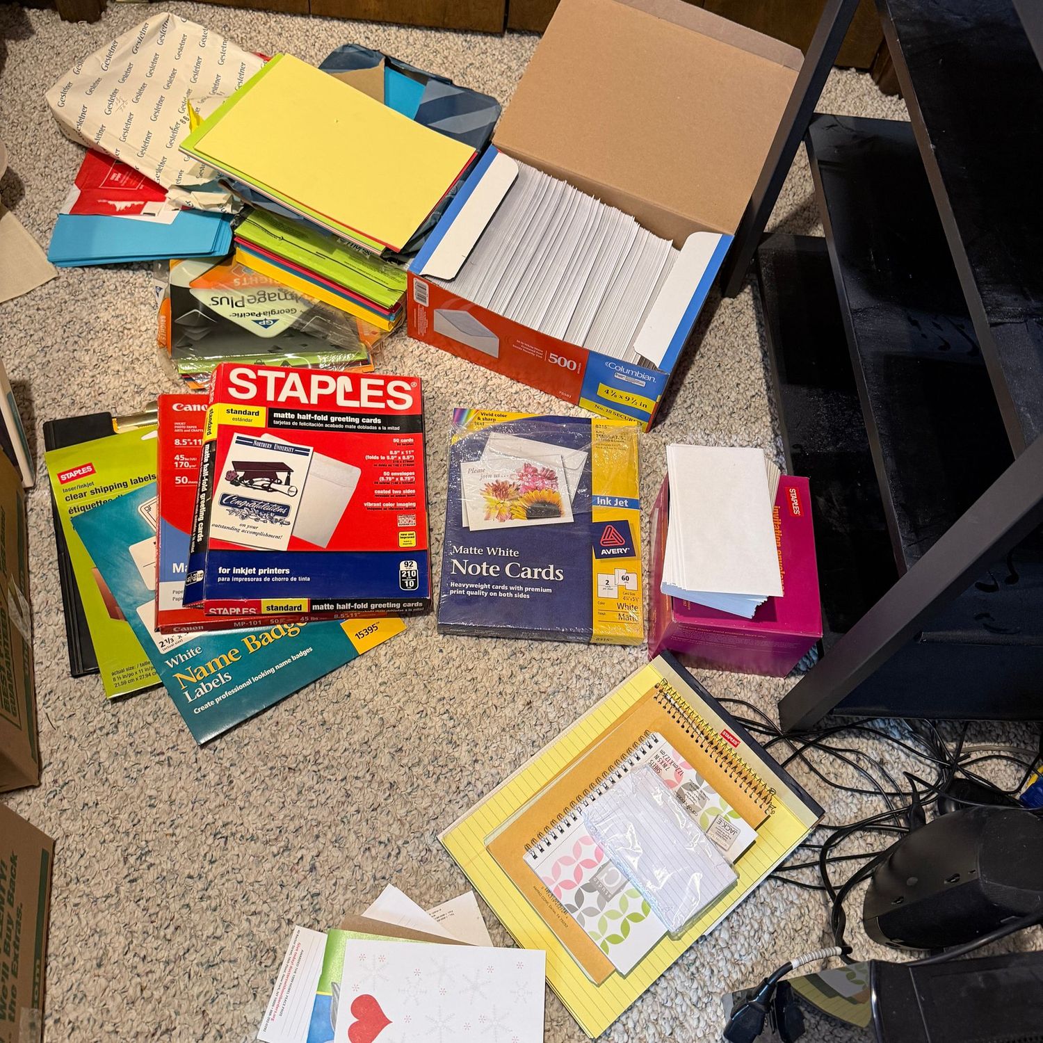 Group of office supplies, color printer paper, envelops & more