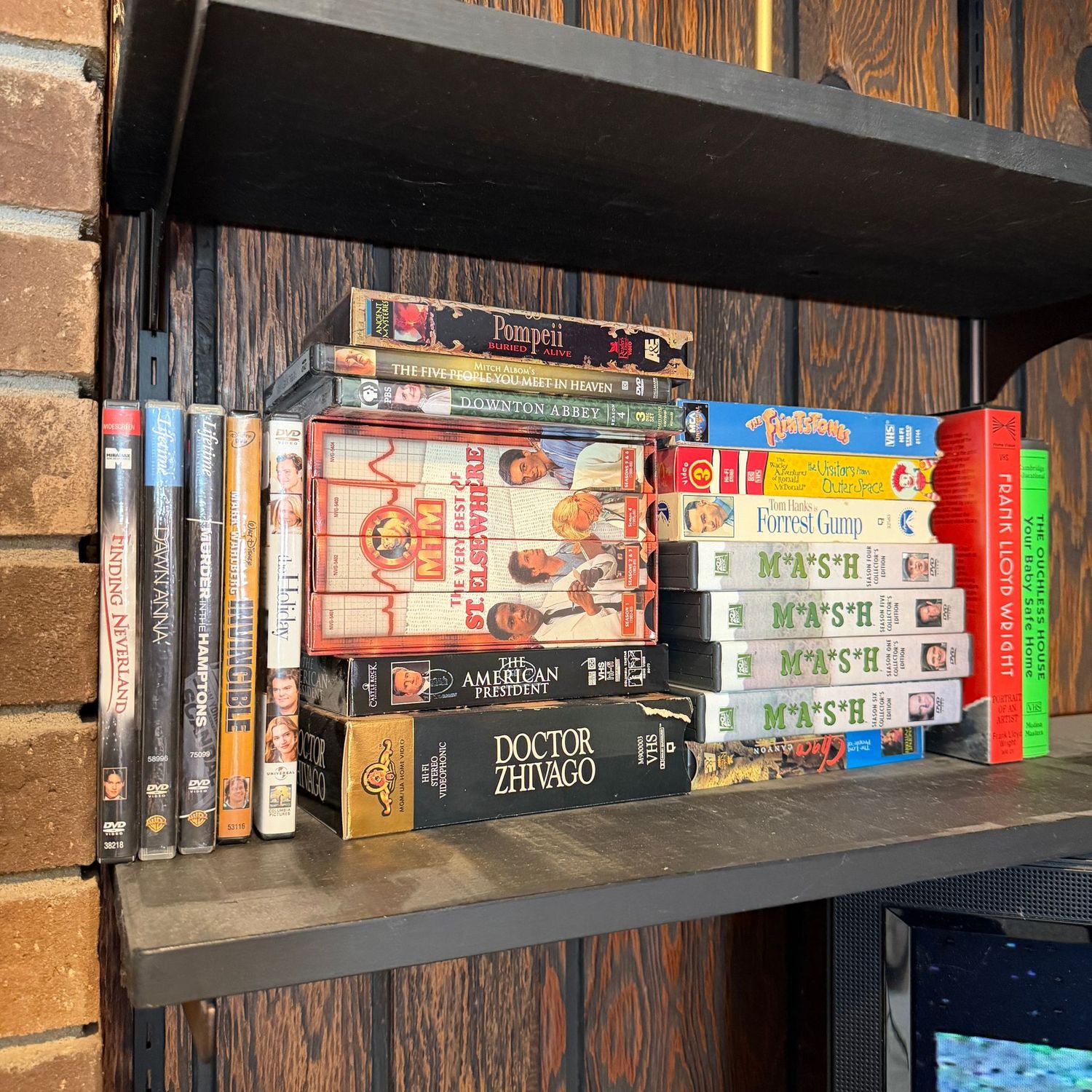 Group of DVDs and VHS tapes